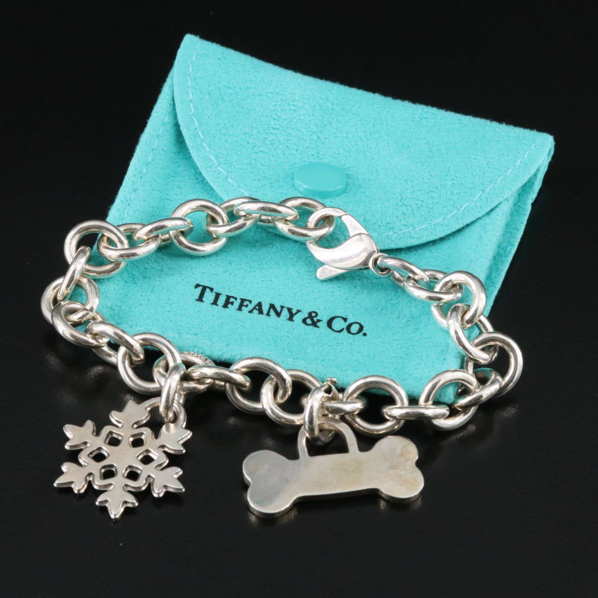 Tiffany & Co. Sterling Bracelet with Two Tiffany Charms