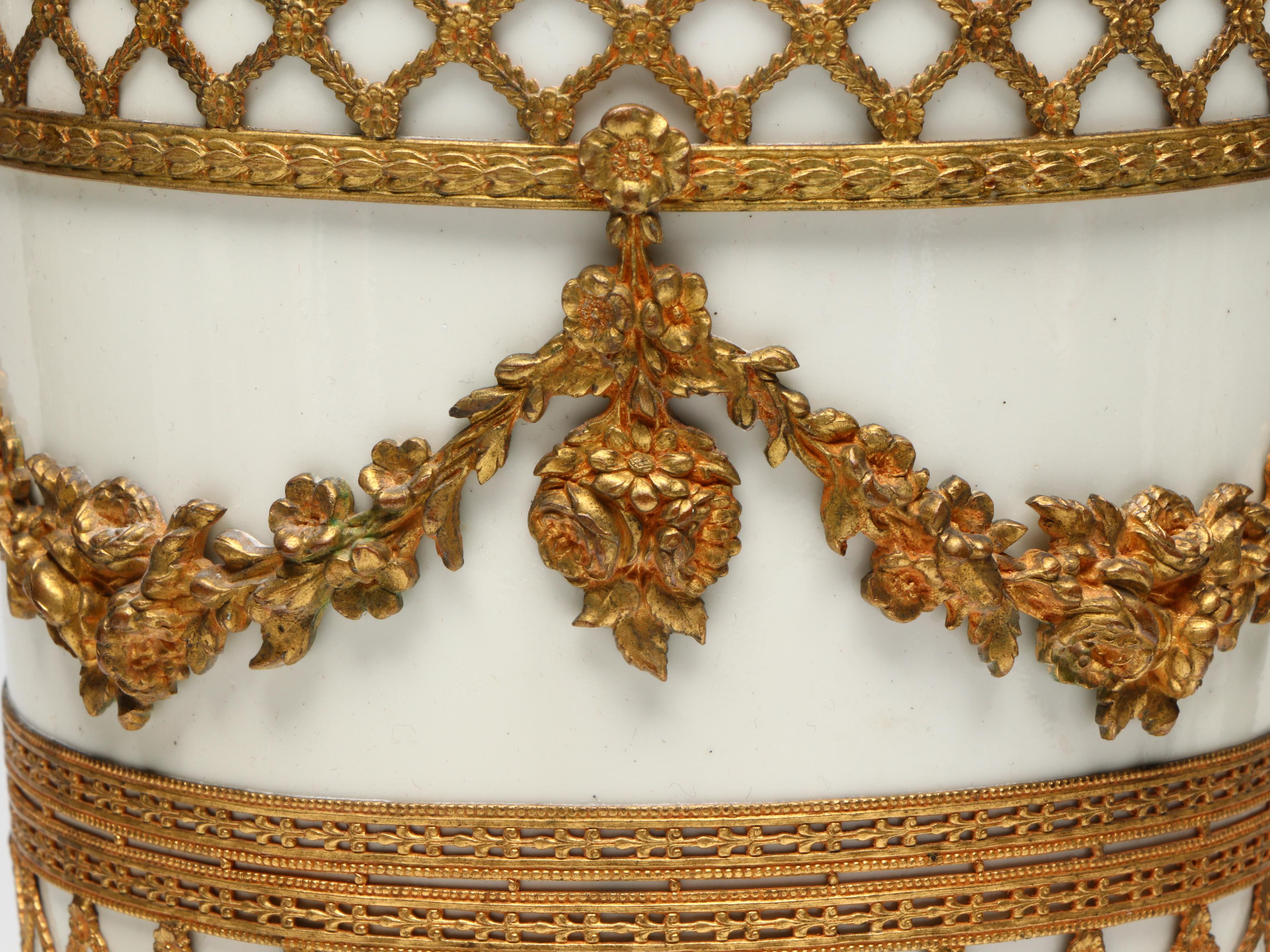 Empire Style Brass Footed Bowl with Metal Wall Sconces and Other Décor