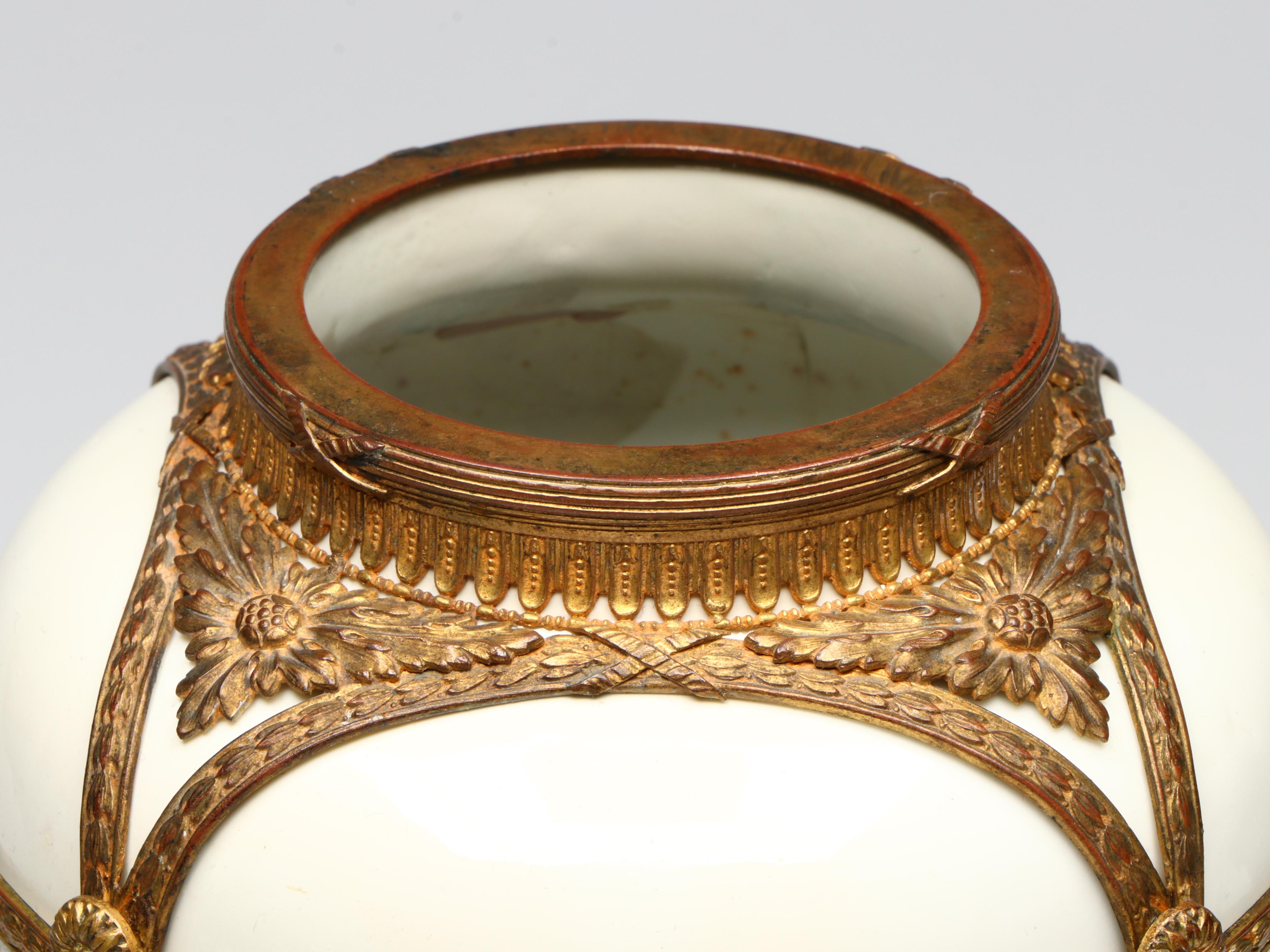 Empire Style Brass Footed Bowl with Metal Wall Sconces and Other Décor