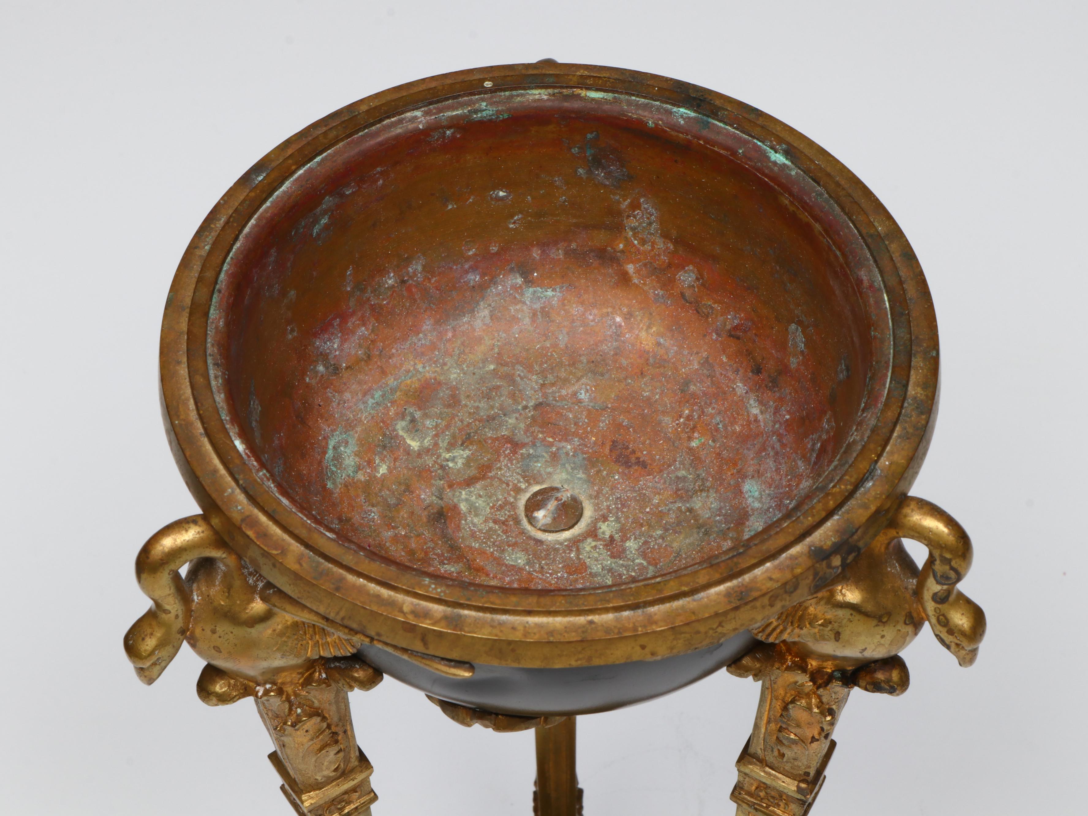 Empire Style Brass Footed Bowl with Metal Wall Sconces and Other Décor