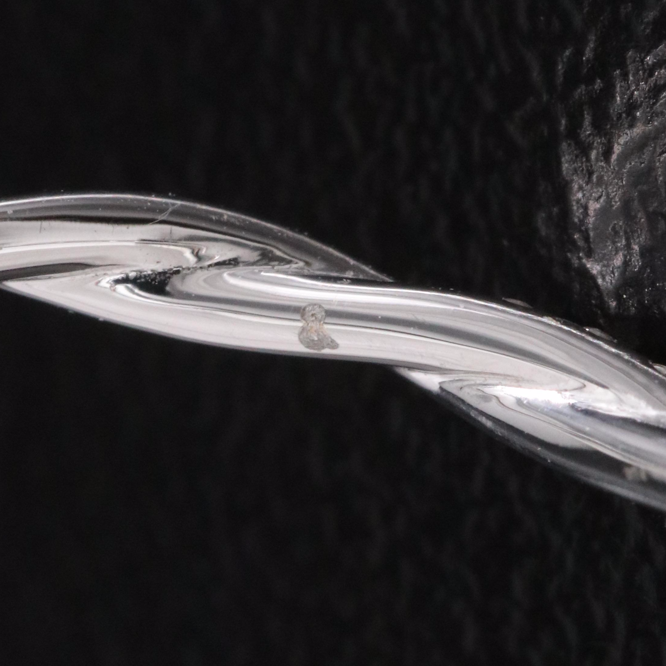 18K 0.14 CTW Lab Grown Diamond Twisted Band