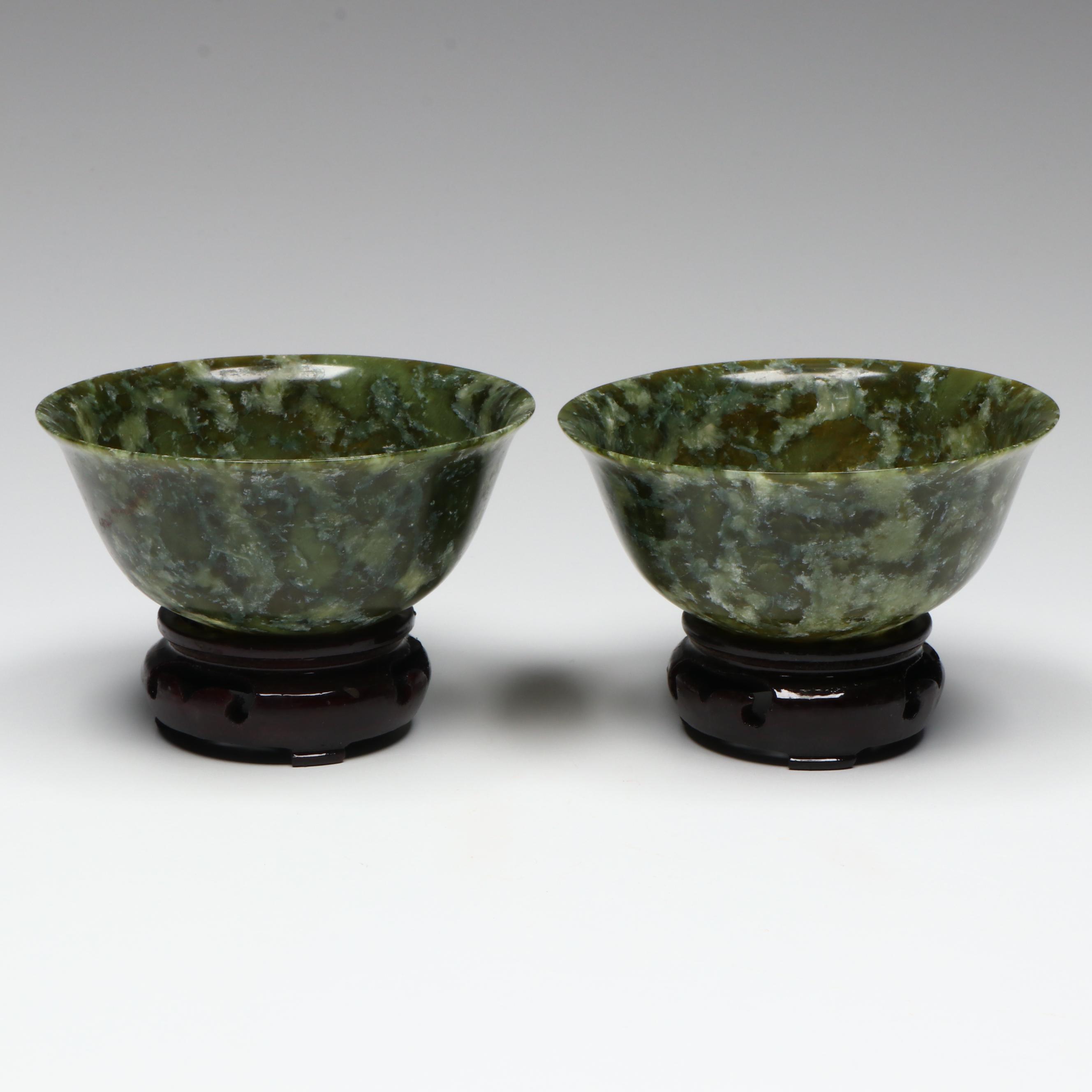 Pair of Chinese Carved Serpentine Bowls on Wooden Stands
