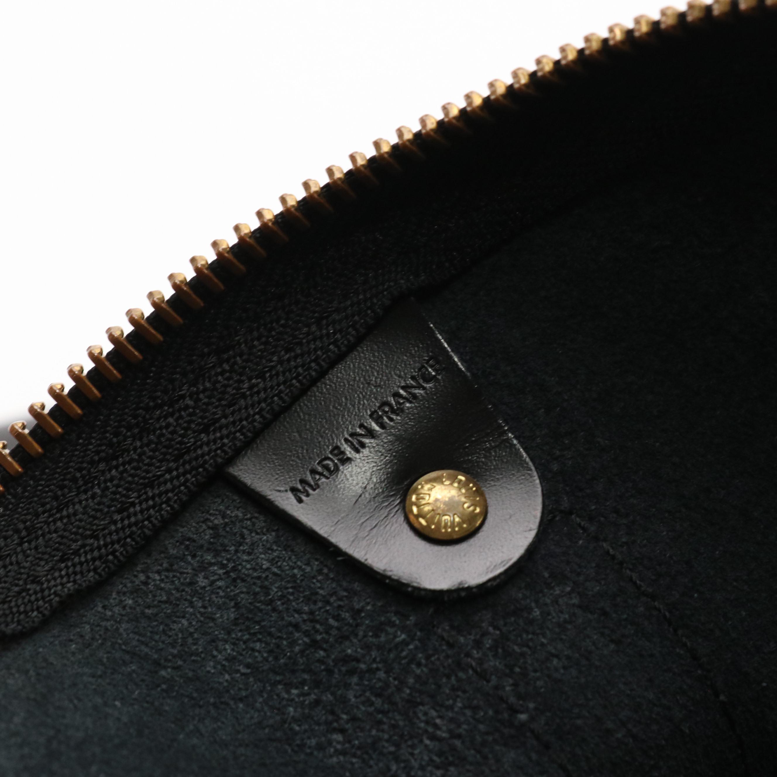 Louis Vuitton Keepall 55 in Black Epi and Smooth Leather