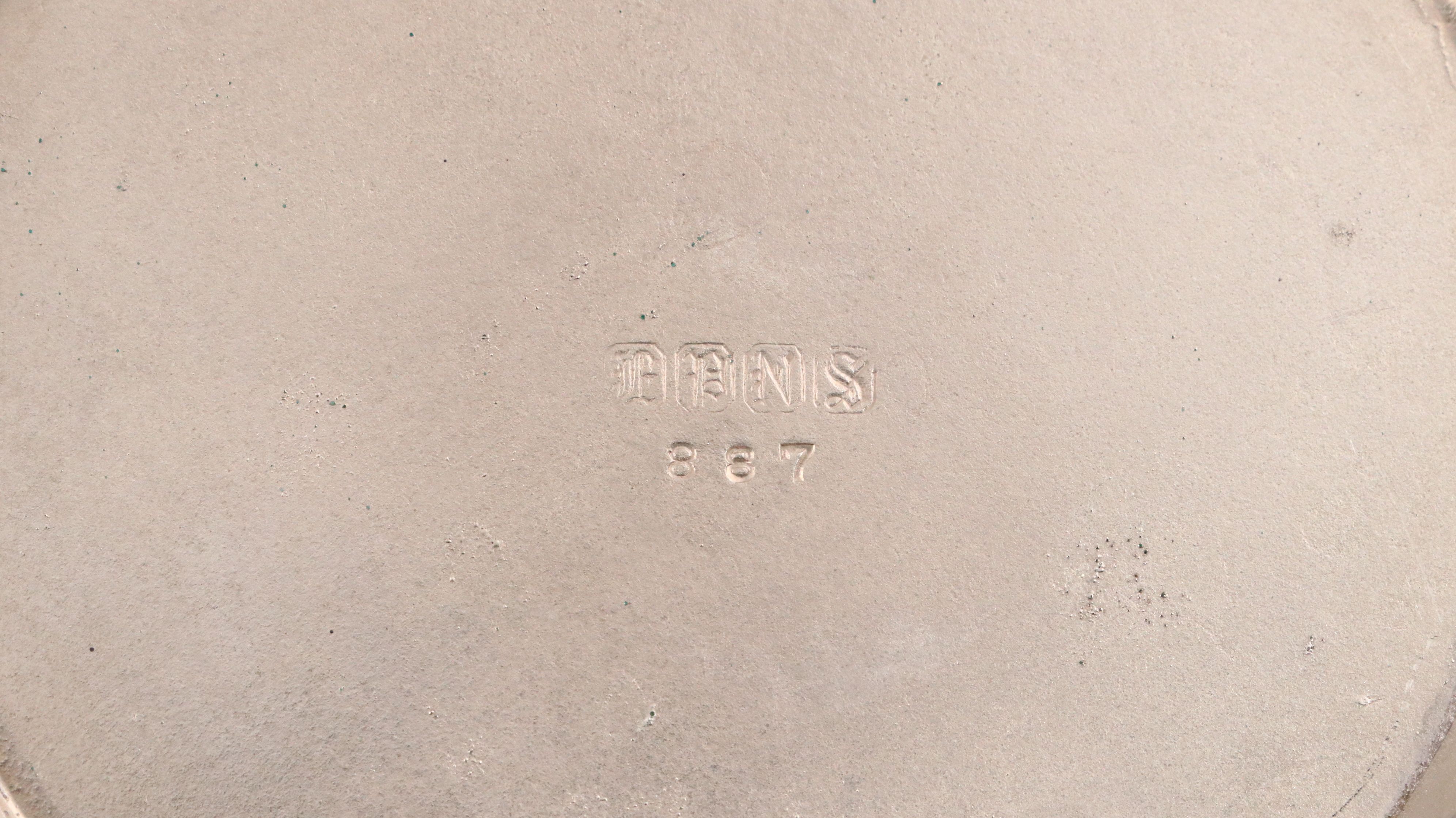 Crescent with Other Silver Plate Water Pitchers and Serving Pieces