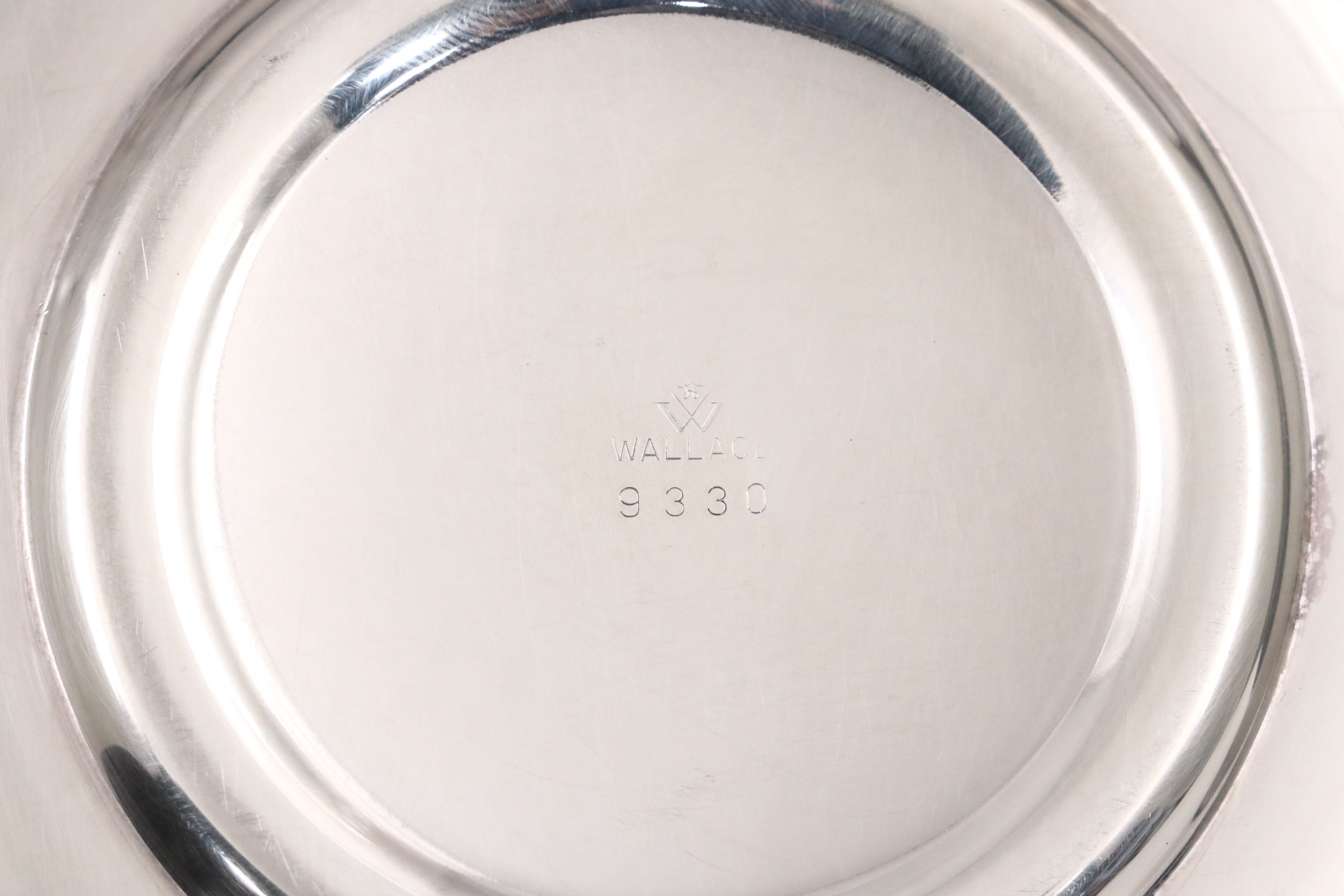 Crescent with Other Silver Plate Water Pitchers and Serving Pieces