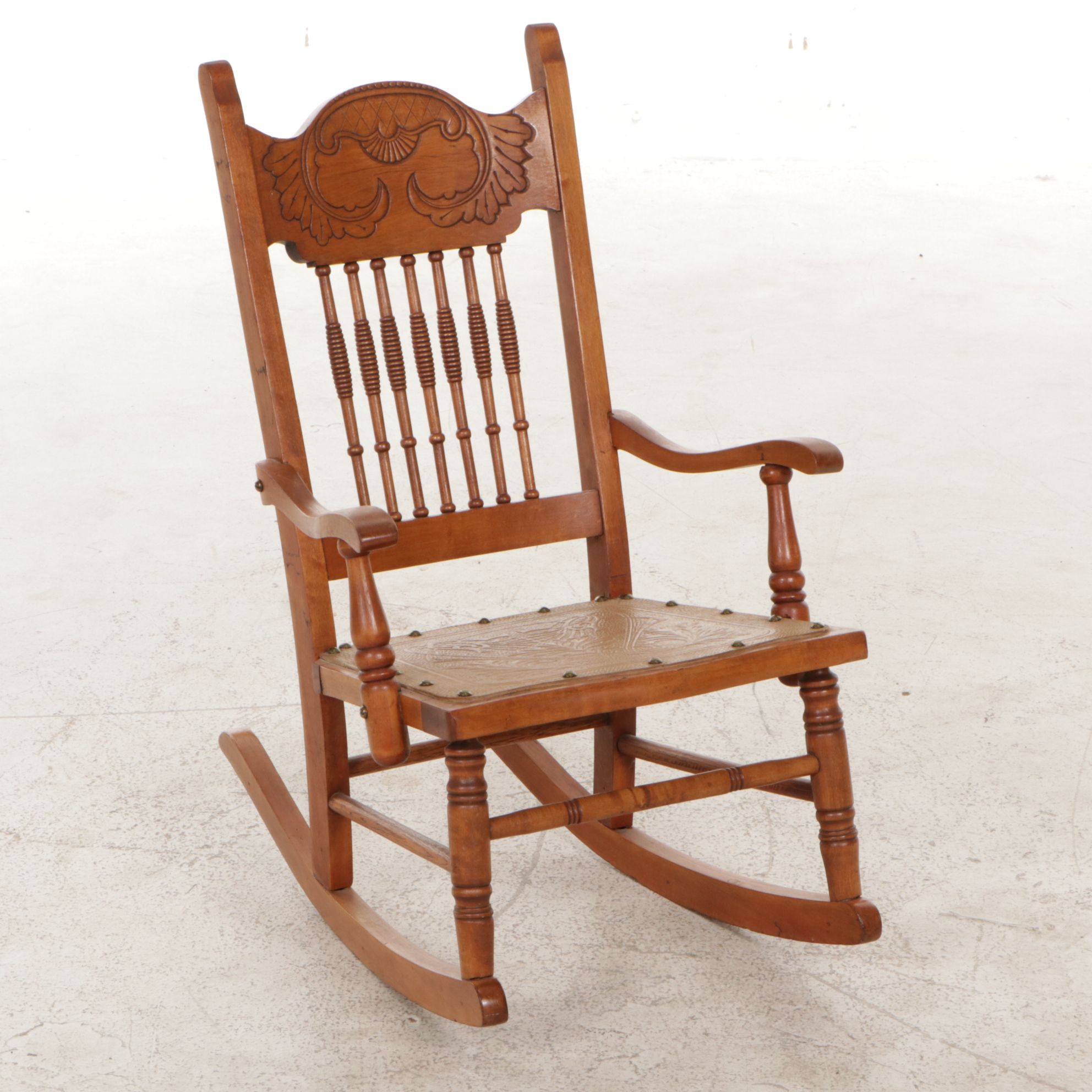 Press-Back Wood Child's Rocking Chair with Embossed Leather Seat
