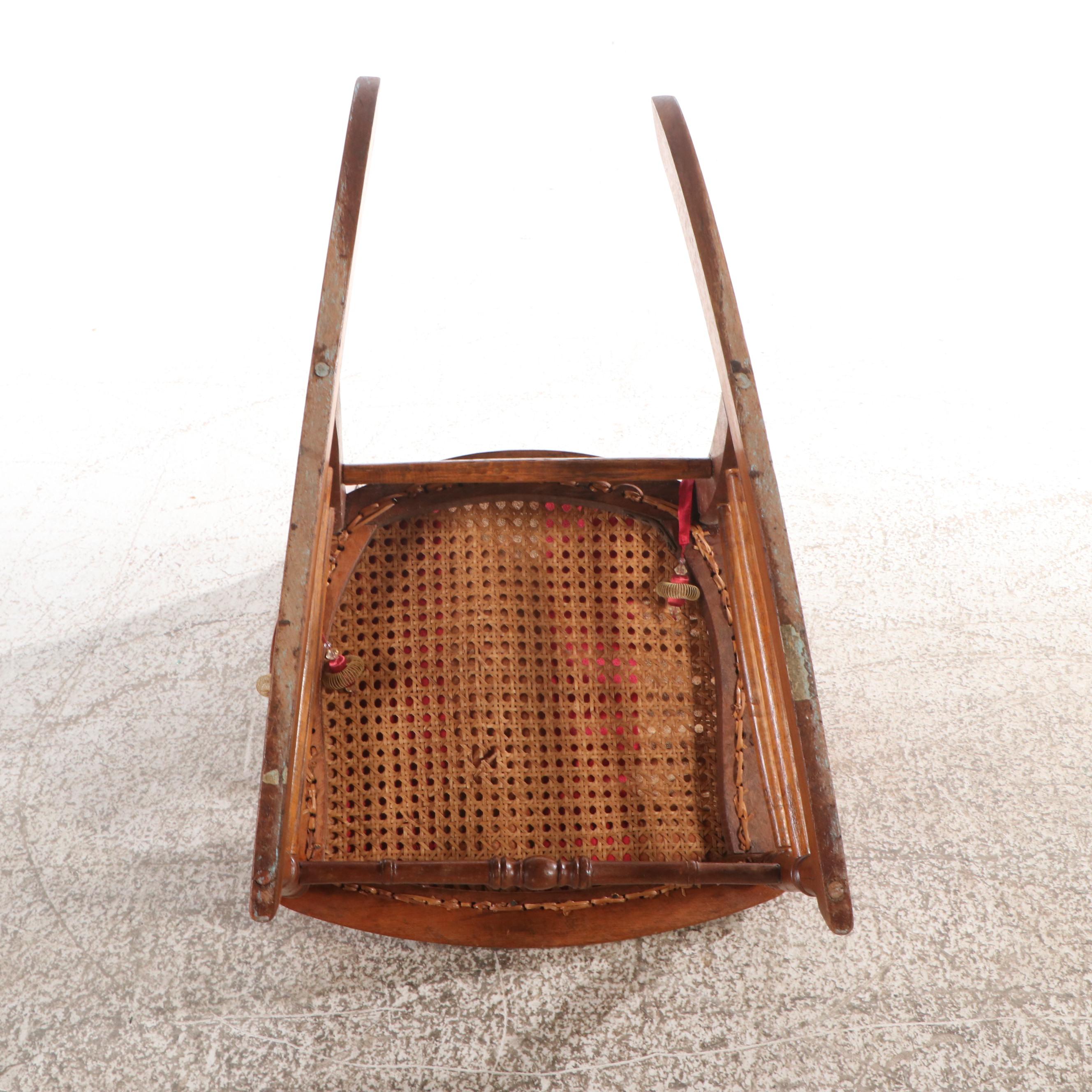 Victorian Carved Walnut Rocking Chair with Rattan Back and Seat