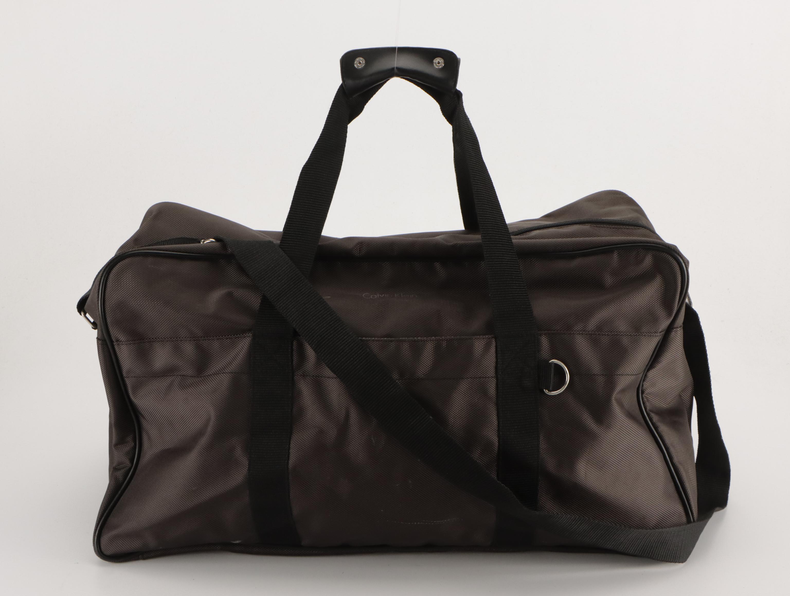 TUMI Alpha 27" Large Wheeled Suitcase in Black Nylon, Calvin Klein Duffel Bag