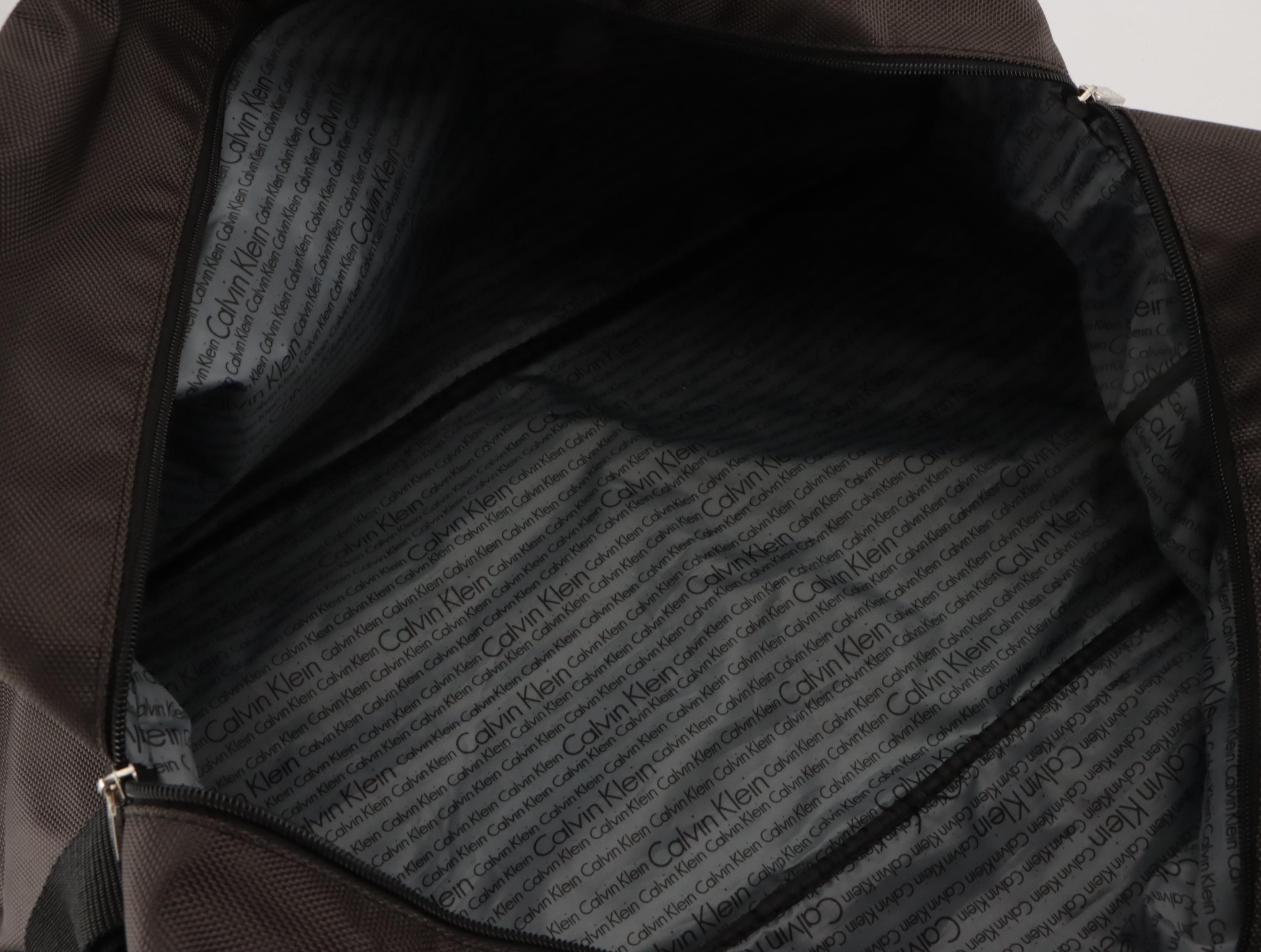 TUMI Alpha 27" Large Wheeled Suitcase in Black Nylon, Calvin Klein Duffel Bag