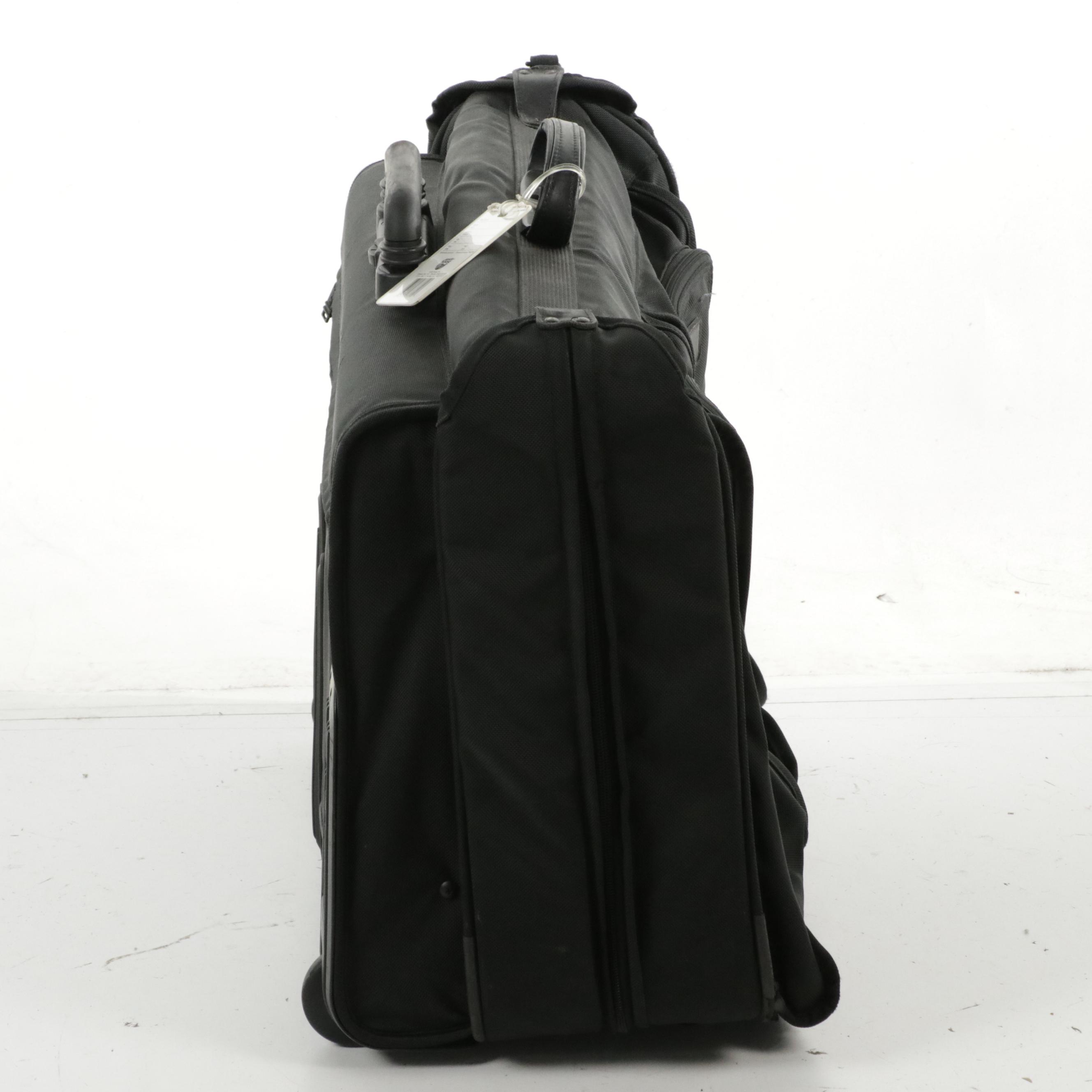 Tumi Two-Wheel Expandable Garment Bag and Large Suitcase in Black