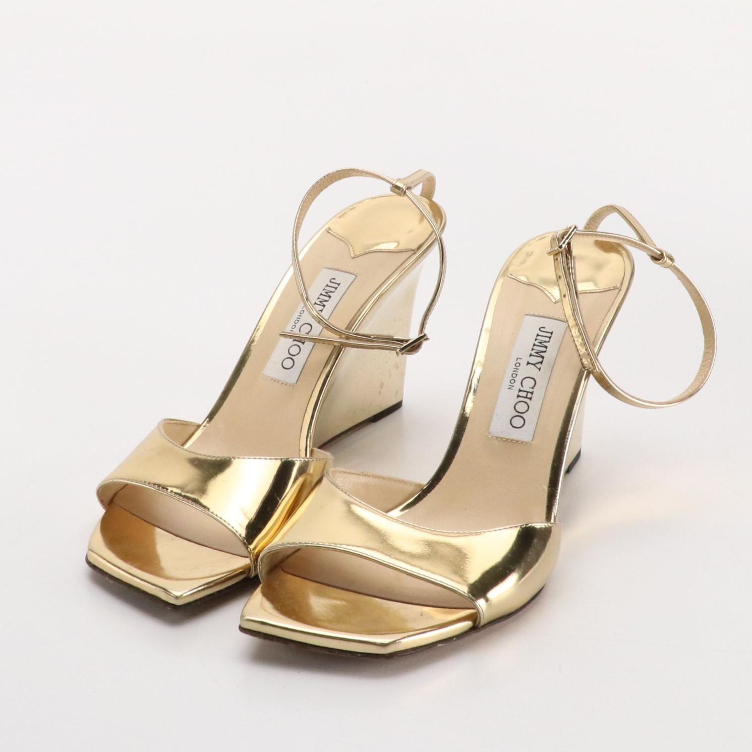 Jimmy Choo "Brien" Ankle Strap Wedges in Metallic Gold Patent Leather