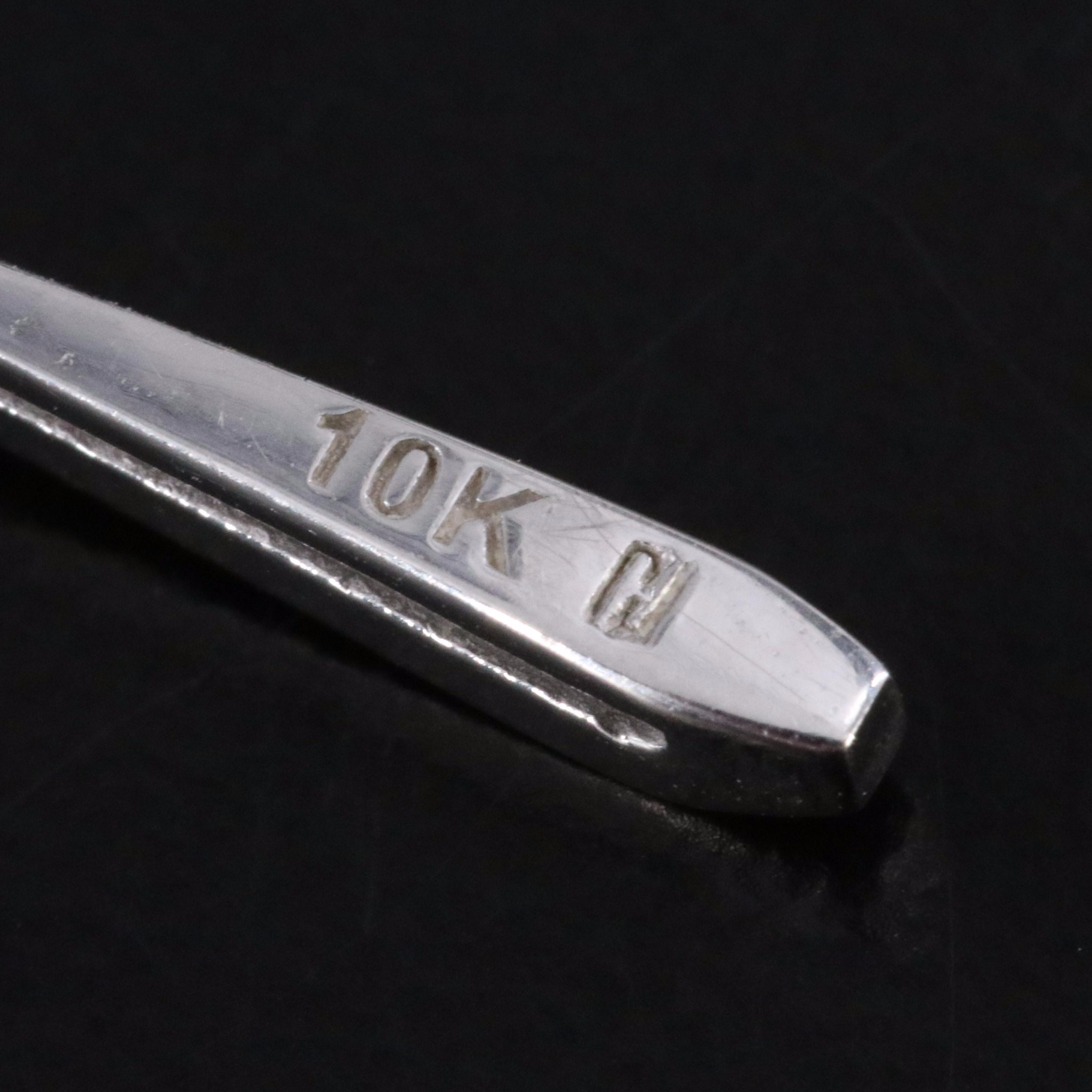 10K 0.04  CTW Diamond Cross Pendant