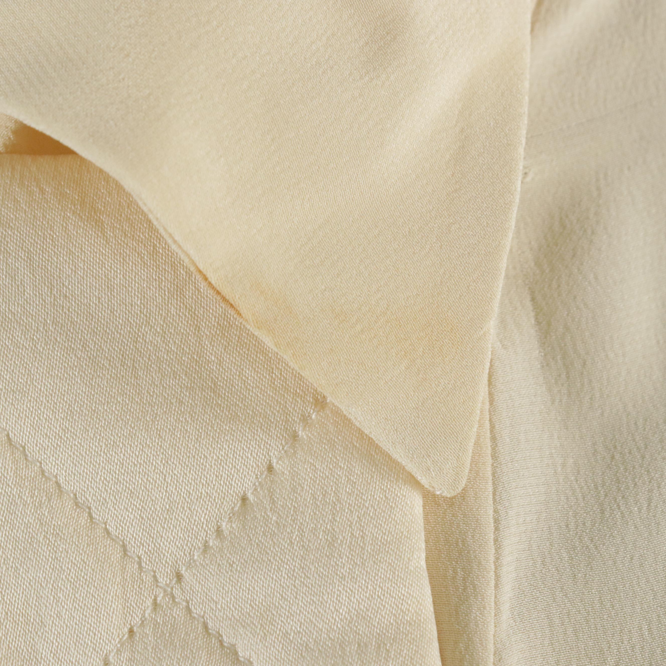 Chanel Boutique Asymmetrical Blouse with Quilted Trim in Silk