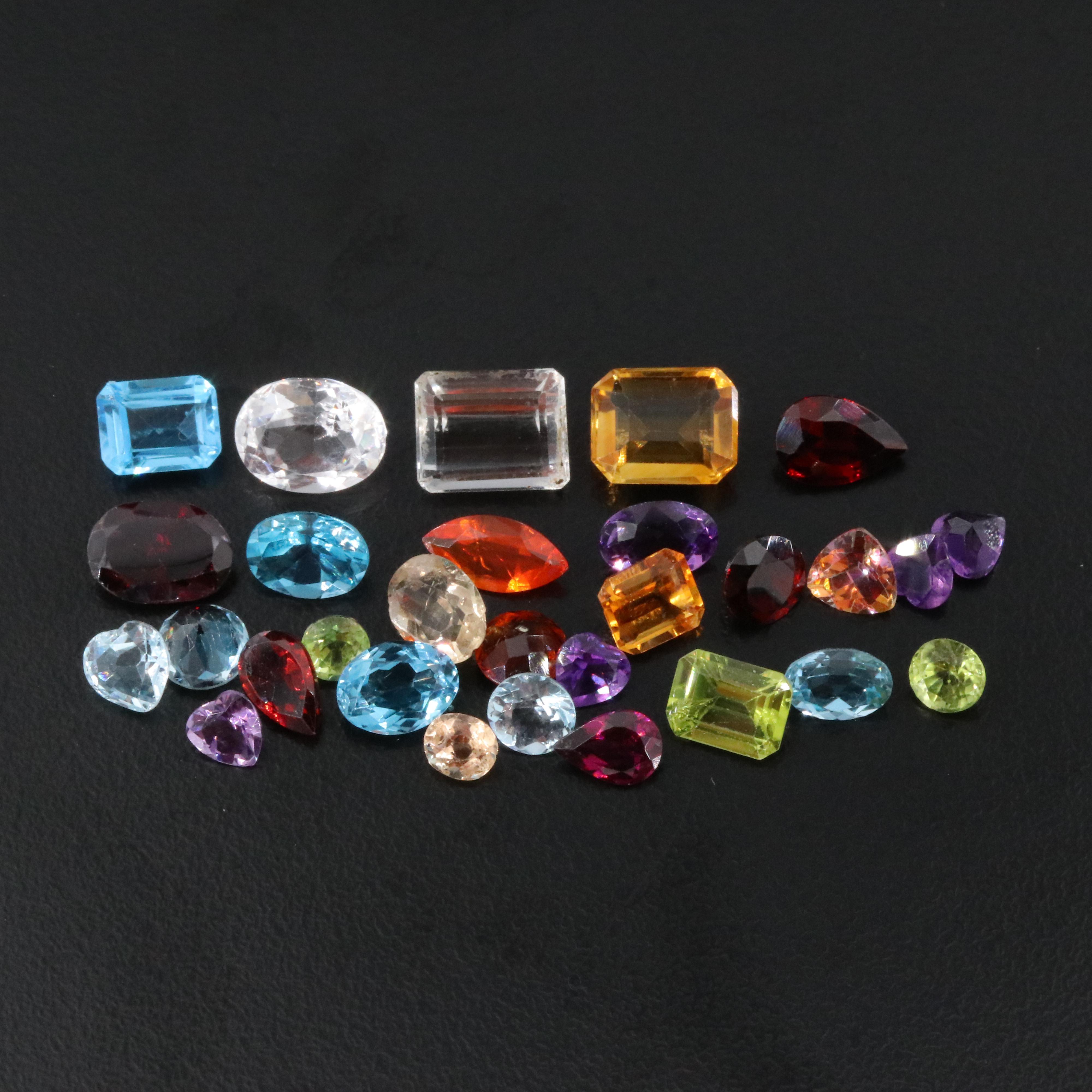 Loose 37.65 CTW Gemstone Lot Including Peridot, Amethyst and Garnet