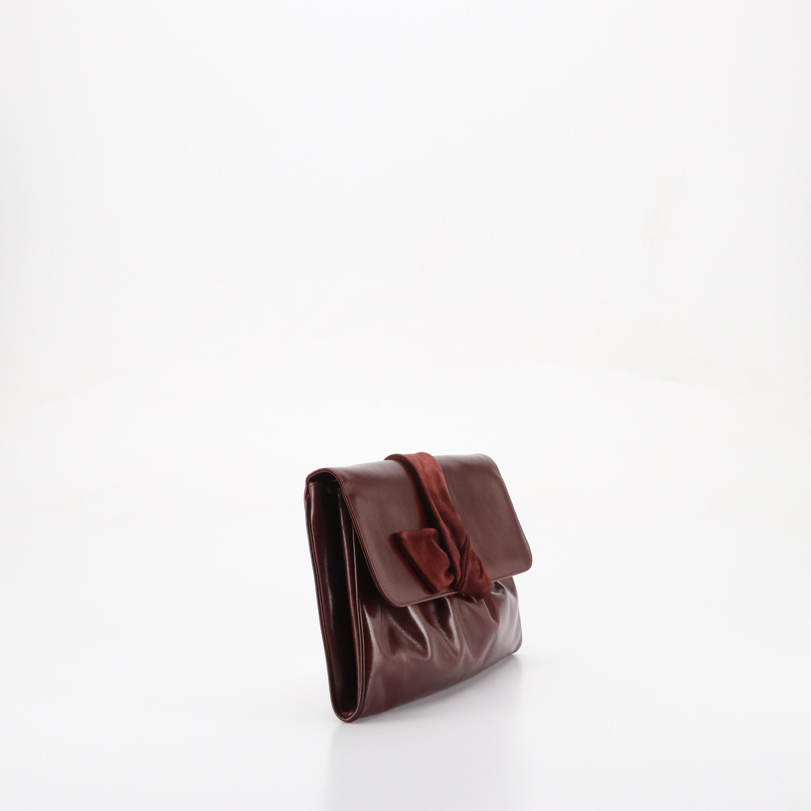 Salvatore Ferragamo Front Flap Ribbon Accented Clutch in Burgundy Leather