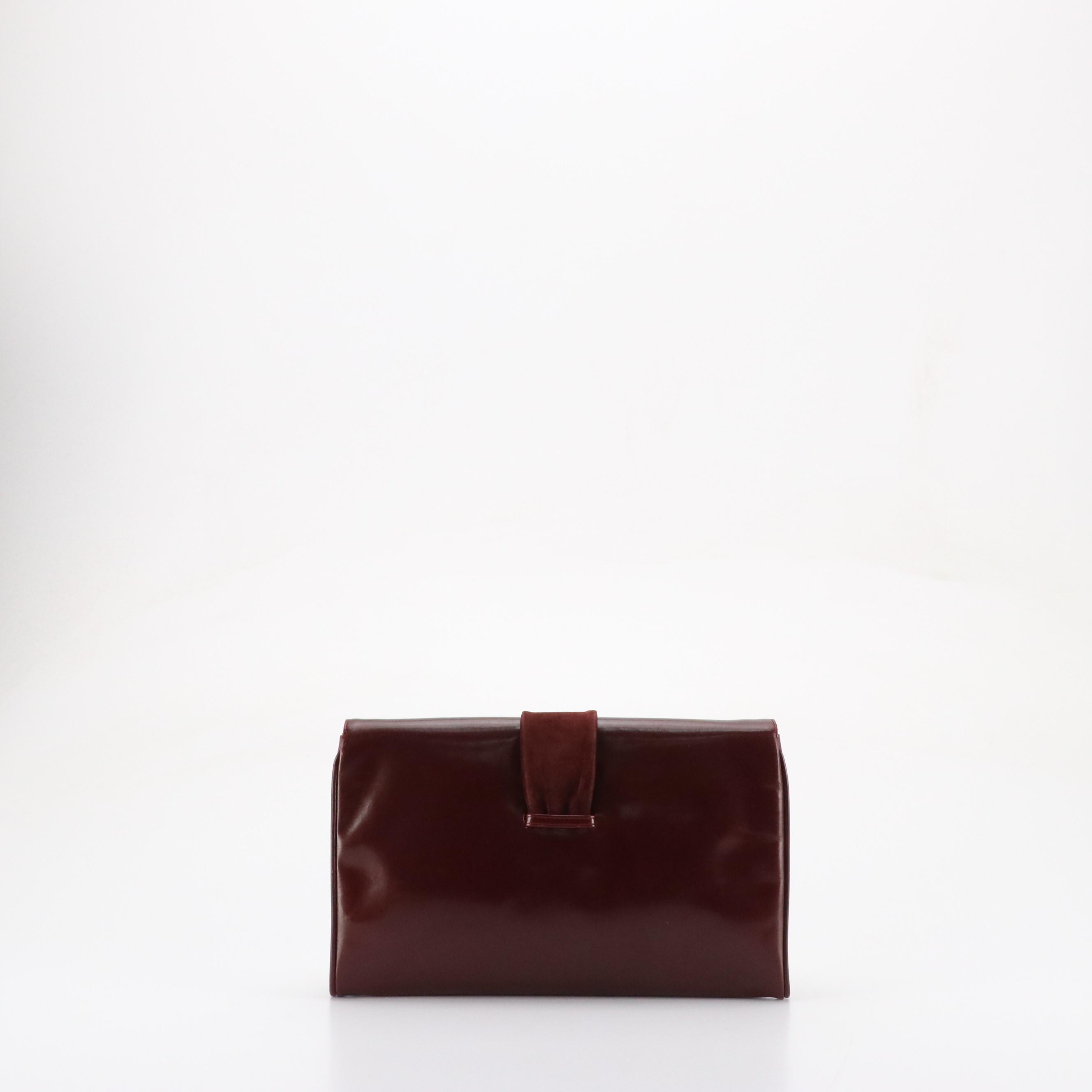 Salvatore Ferragamo Front Flap Ribbon Accented Clutch in Burgundy Leather