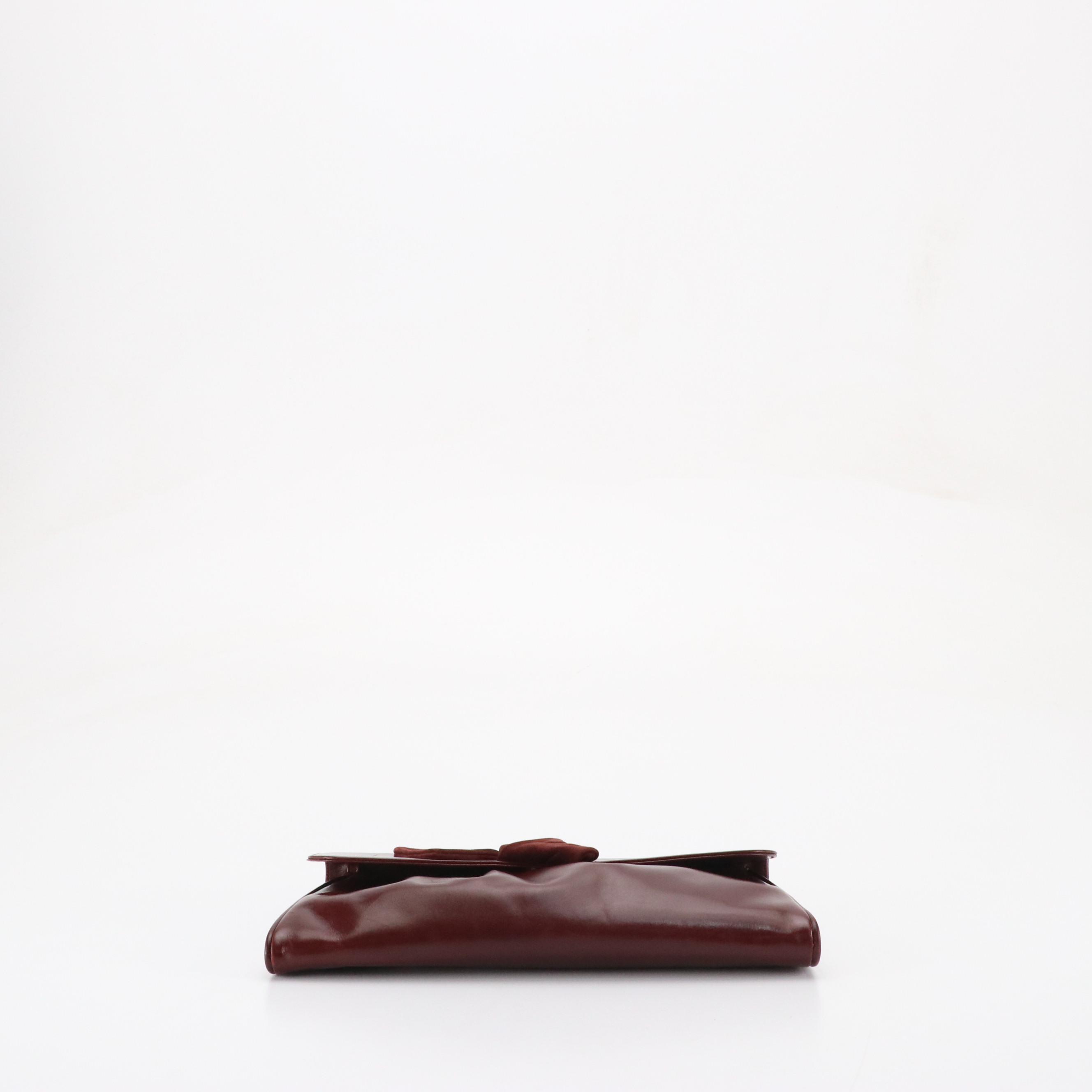 Salvatore Ferragamo Front Flap Ribbon Accented Clutch in Burgundy Leather