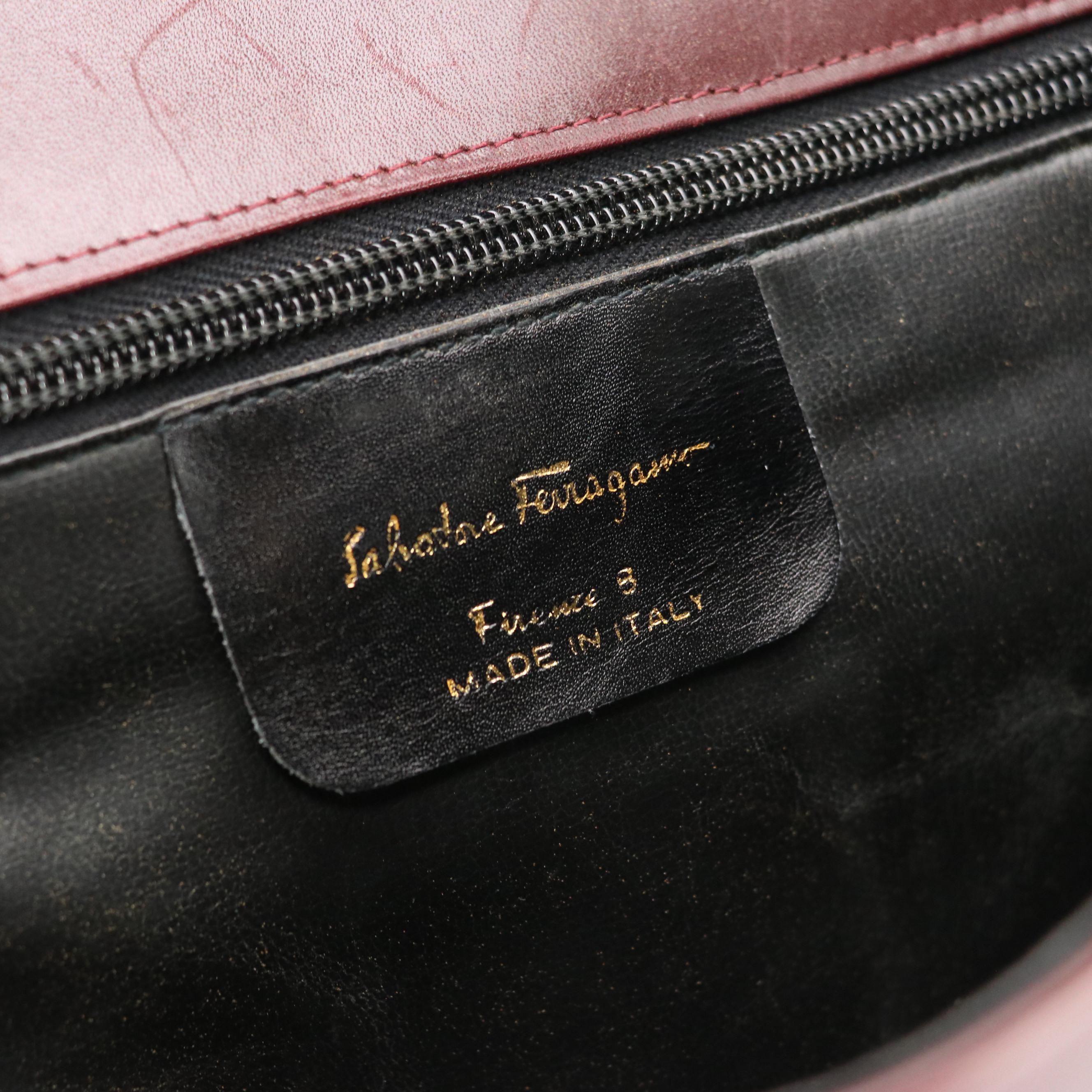 Salvatore Ferragamo Front Flap Ribbon Accented Clutch in Burgundy Leather