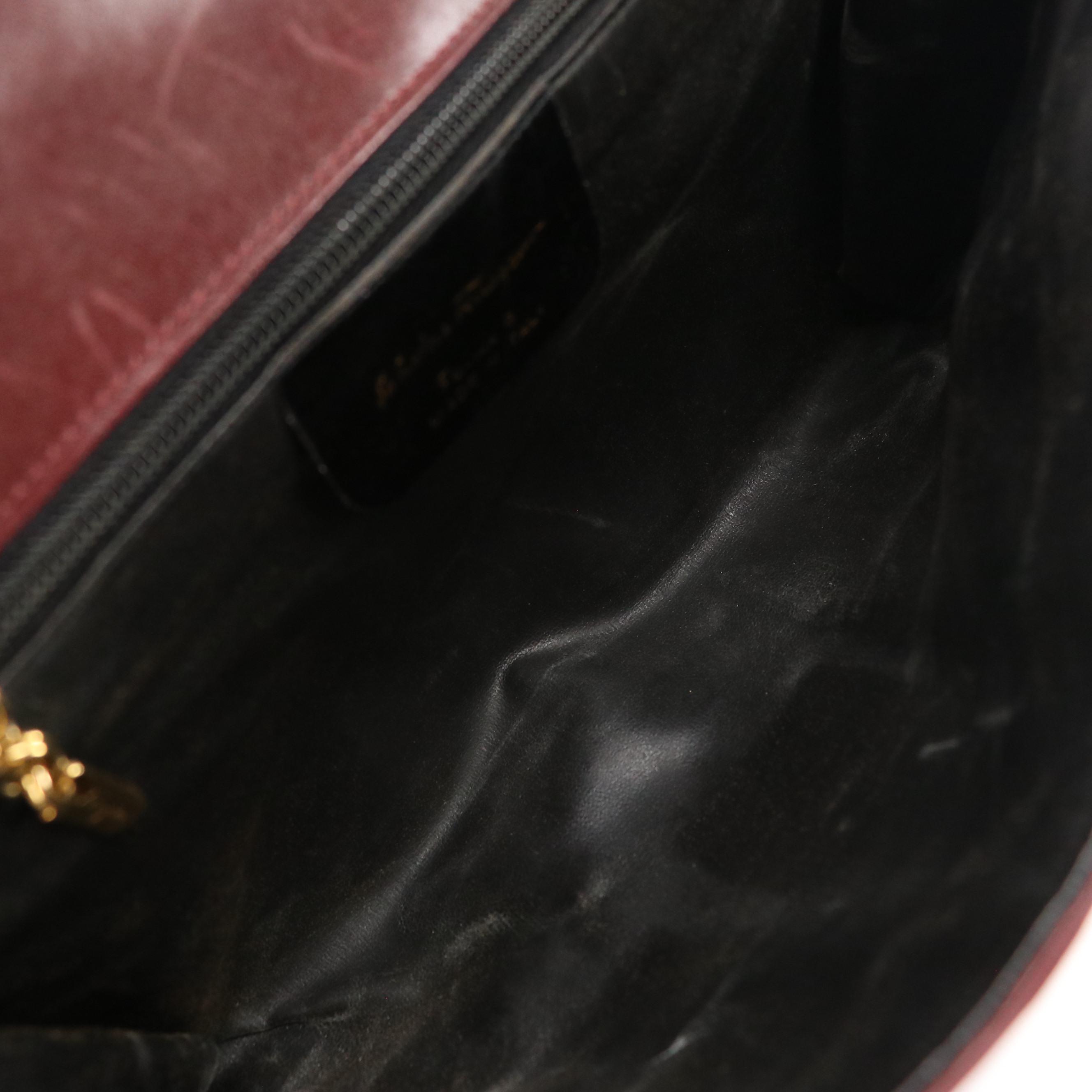 Salvatore Ferragamo Front Flap Ribbon Accented Clutch in Burgundy Leather