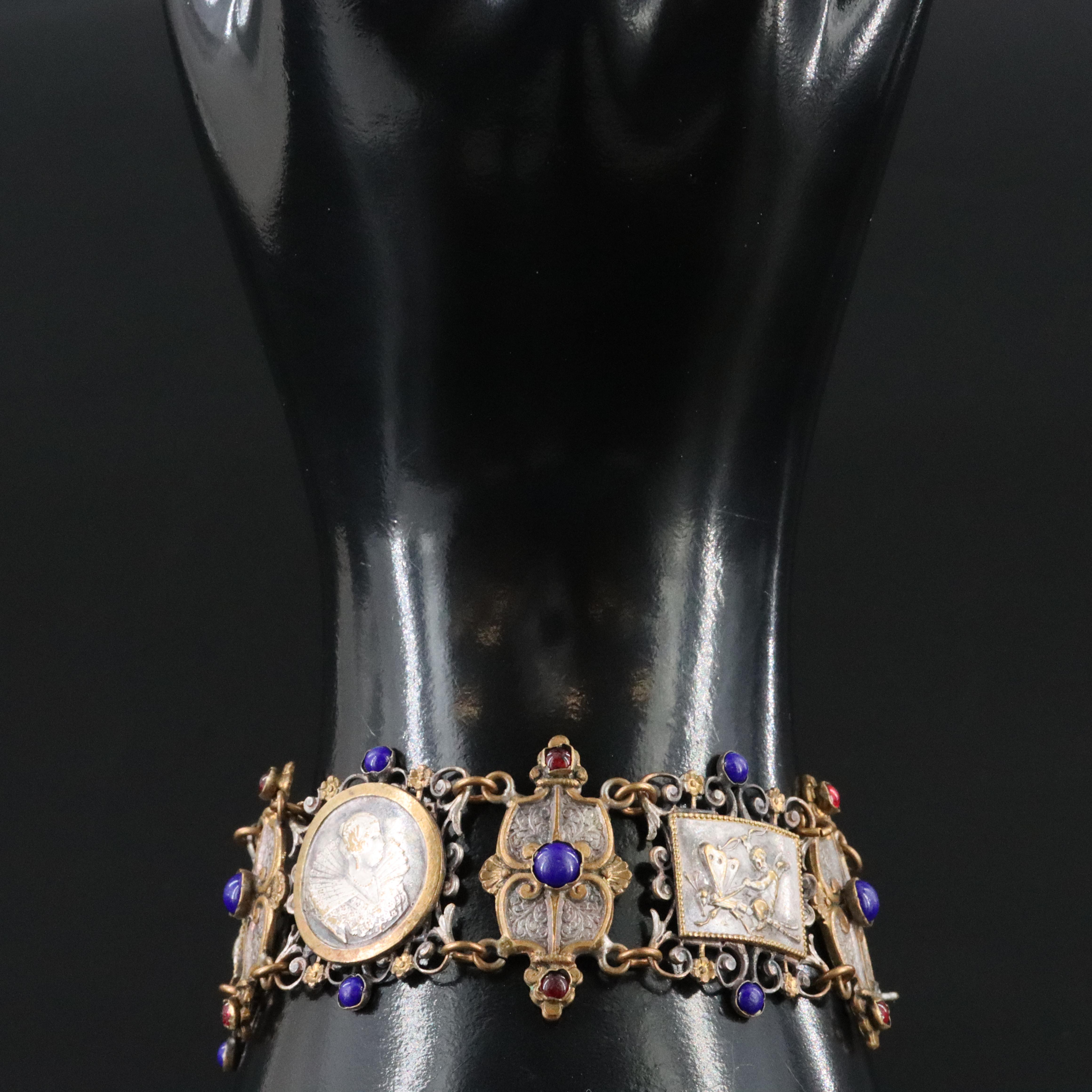 Figural Scrolling Panel Bracelet