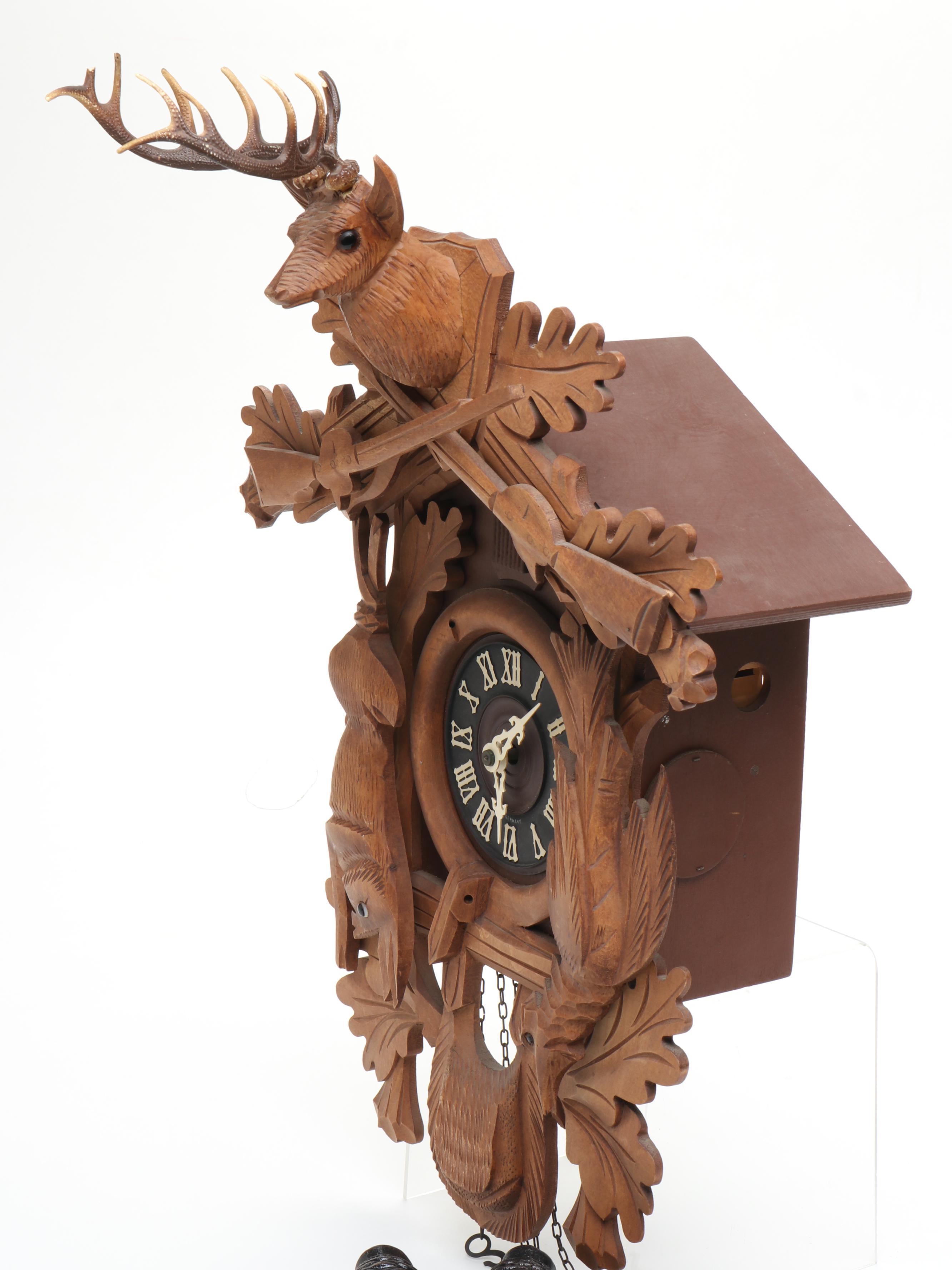West German Carved Wood Cuckoo Clock with Regula Movement