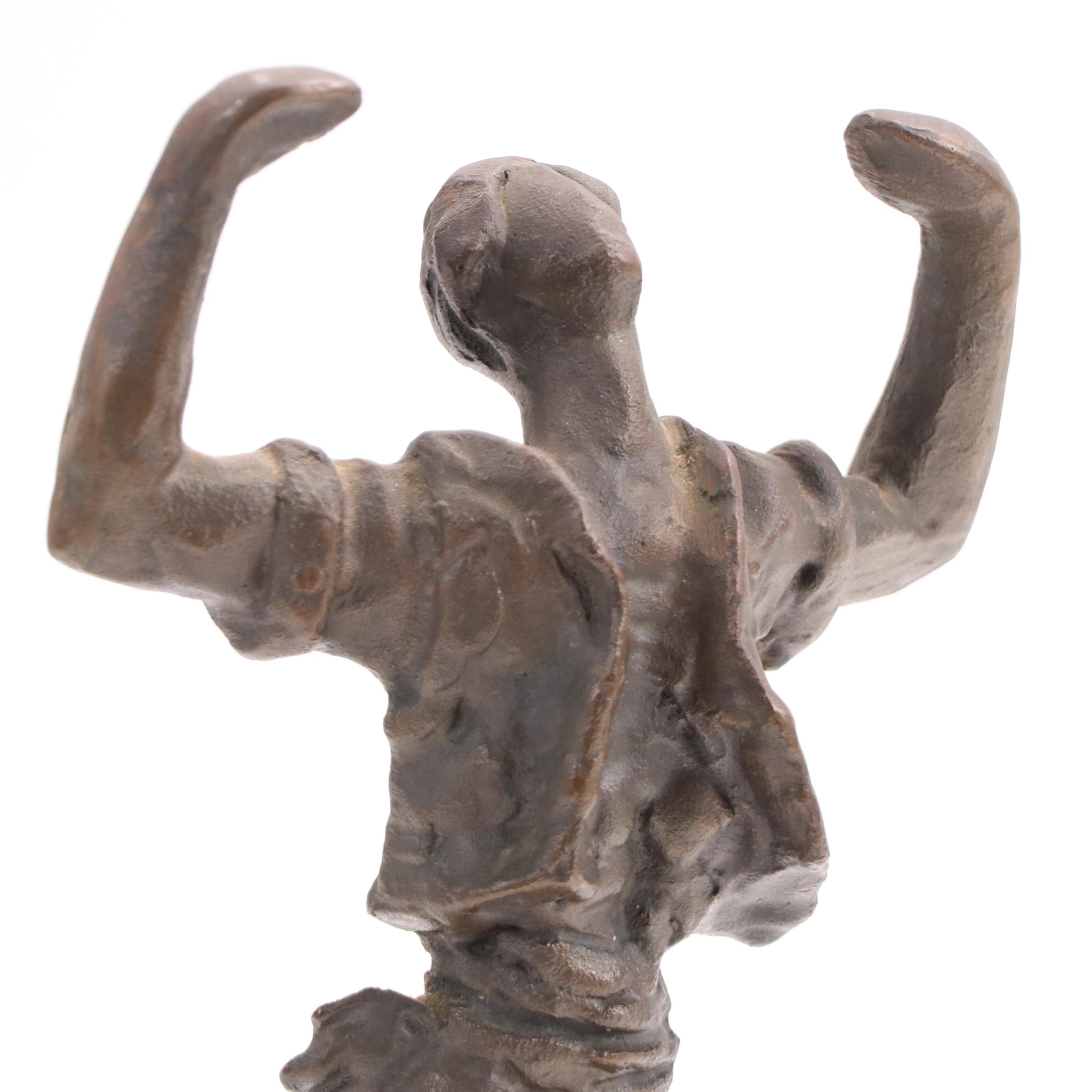 Stylized Bronze Figurine of Man in Triumphant Pose, Late 20th/21st Century