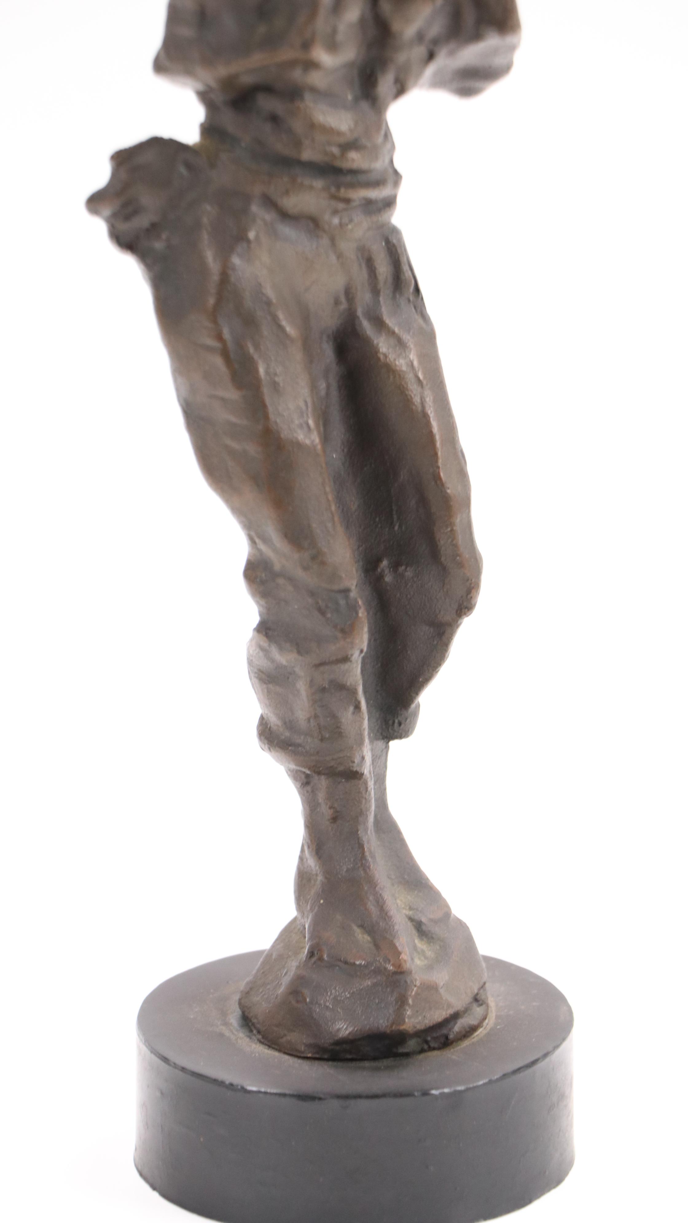 Stylized Bronze Figurine of Man in Triumphant Pose, Late 20th/21st Century