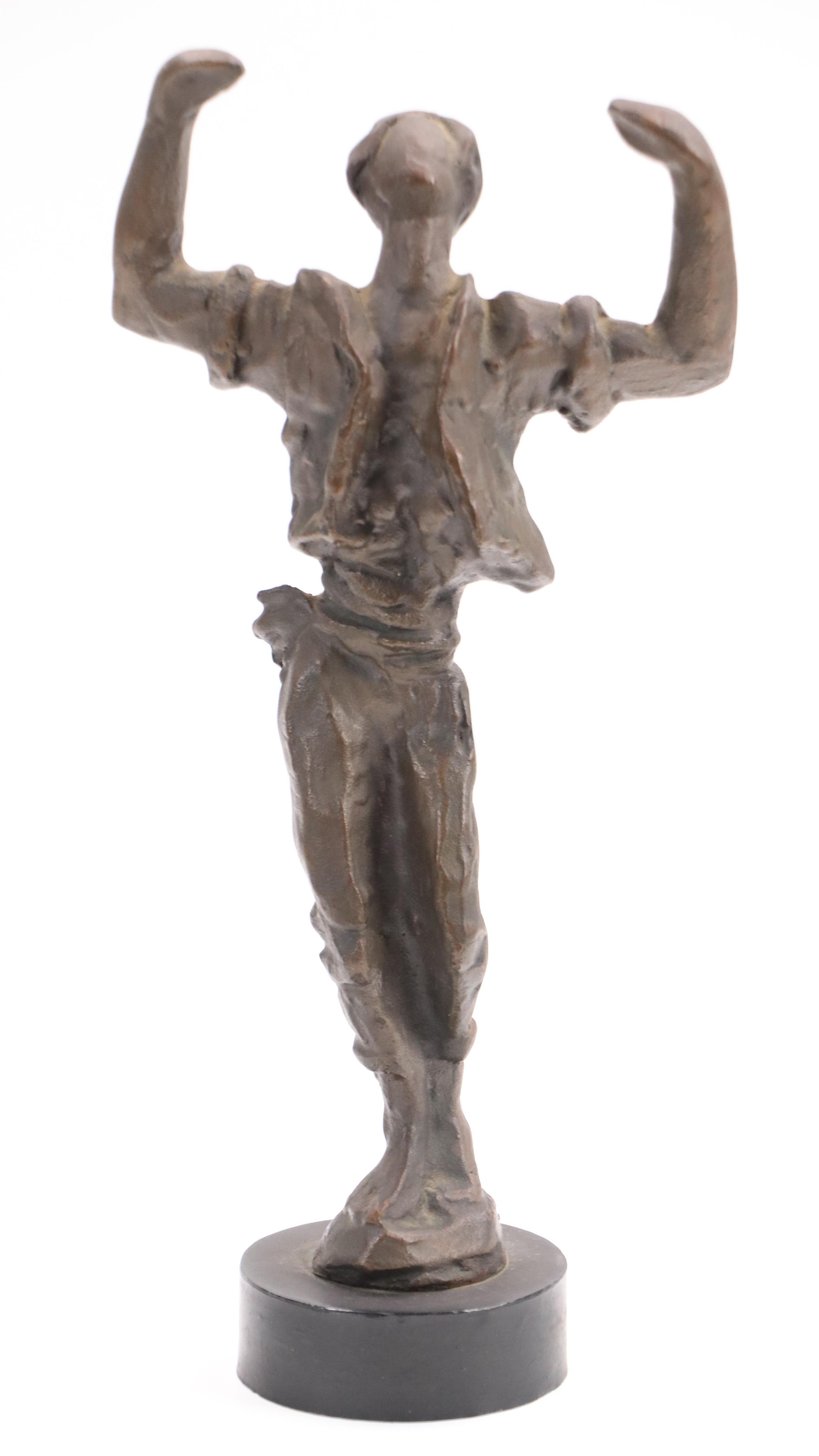 Stylized Bronze Figurine of Man in Triumphant Pose, Late 20th/21st Century