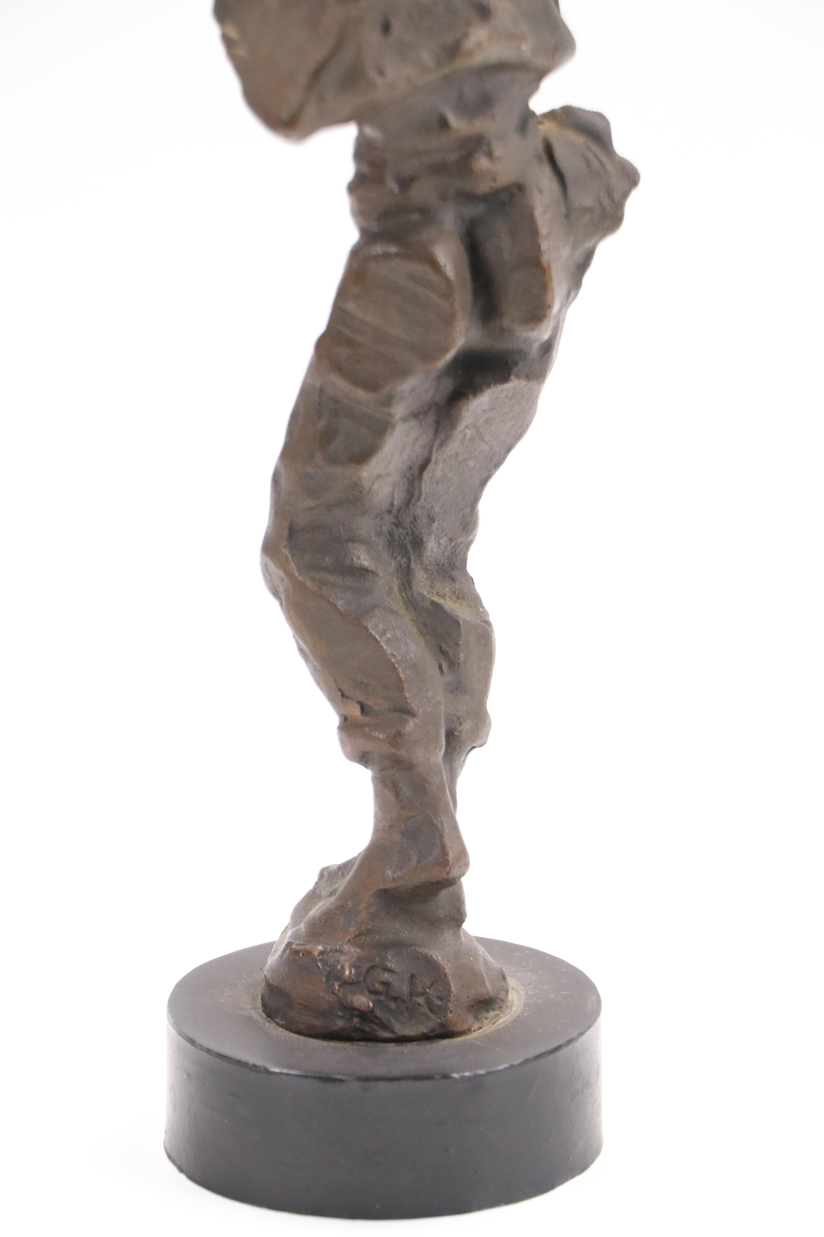 Stylized Bronze Figurine of Man in Triumphant Pose, Late 20th/21st Century