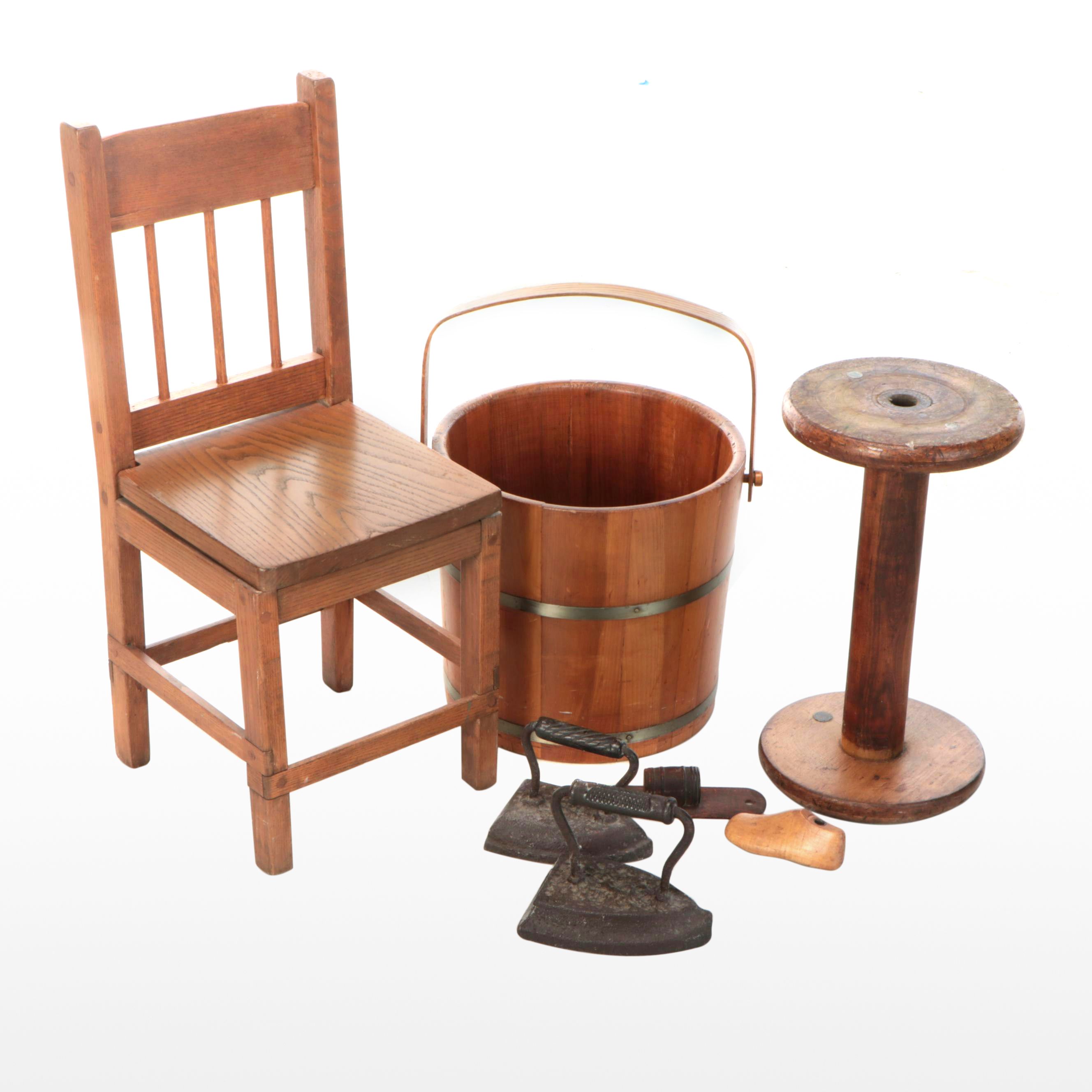 Rustic Style Wood Chair and Bucket with Iron Flat Irons and Other Wood Décor