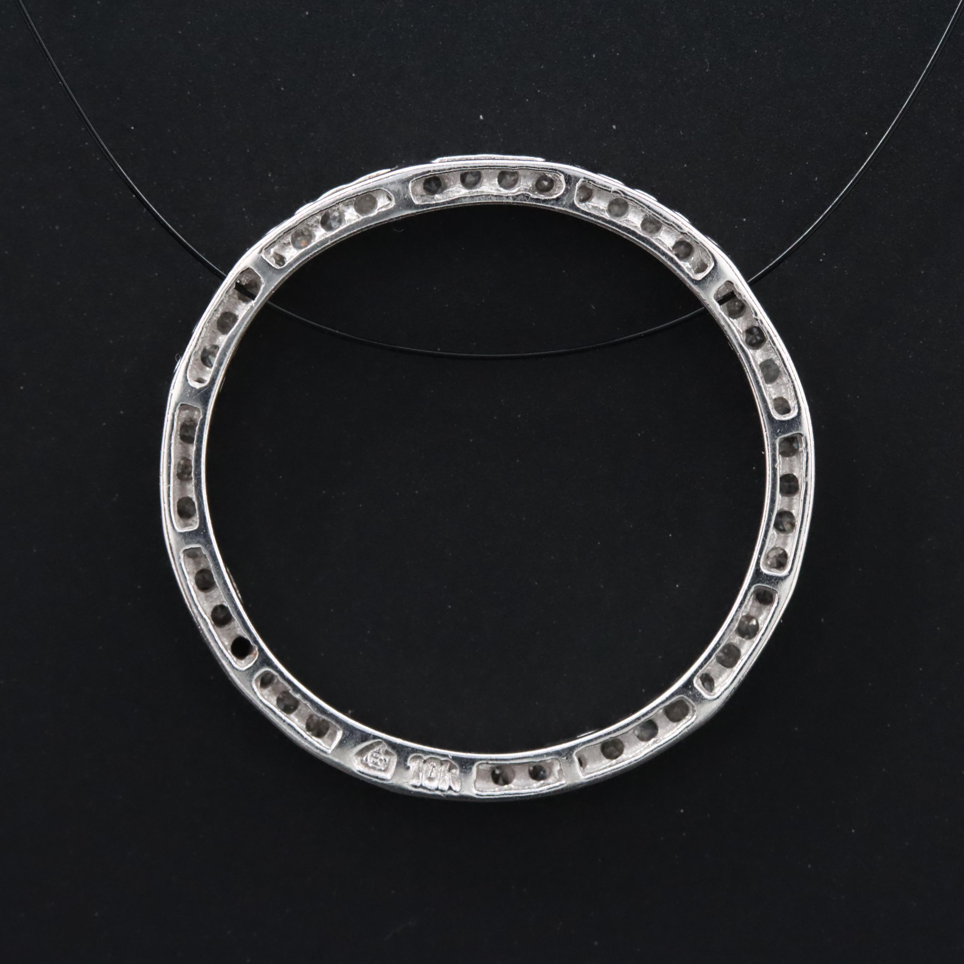 10K 0.26 CTW Diamond Circle Pendant