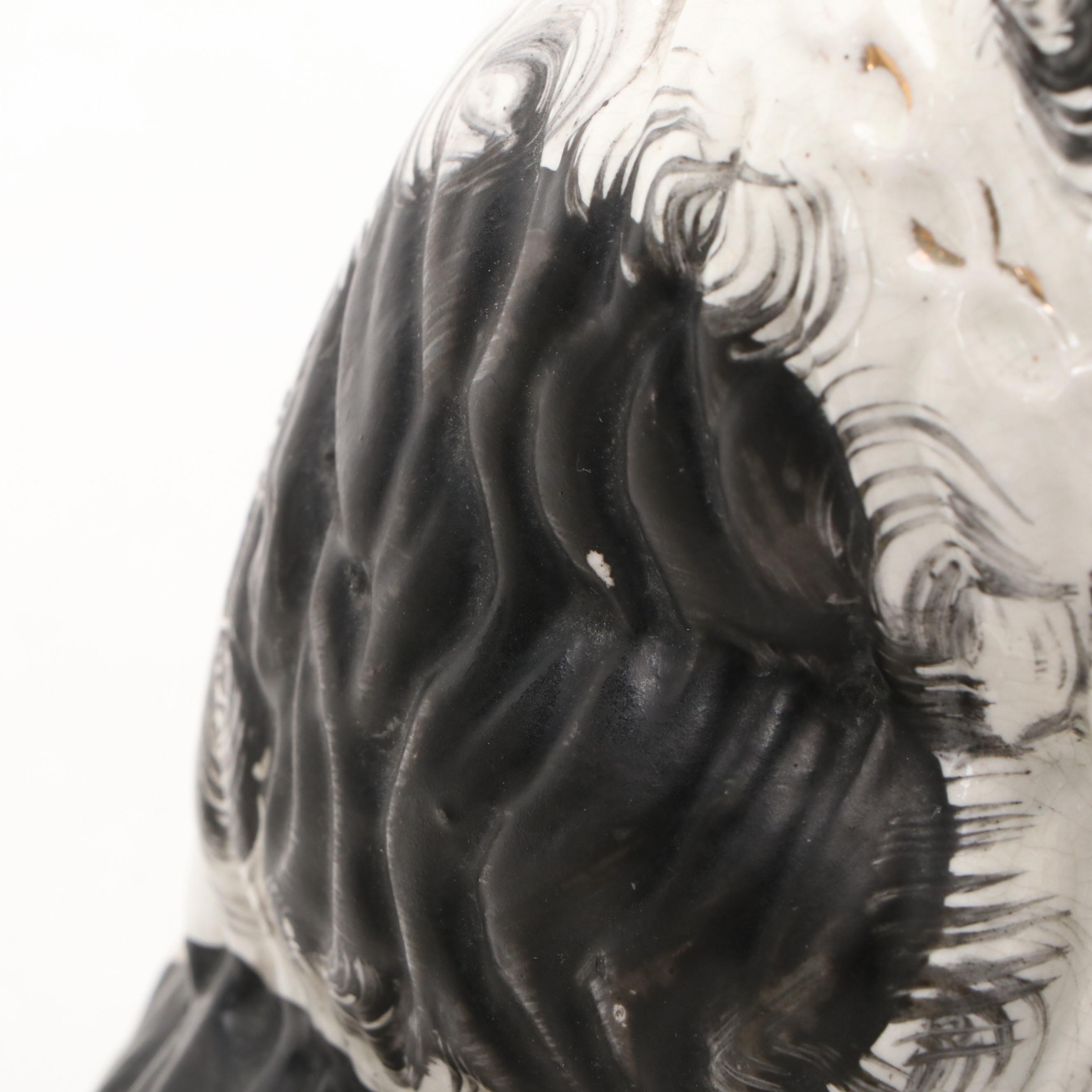 Pair of Staffordshire Black and White Spaniel Figurines, Late 19th Century