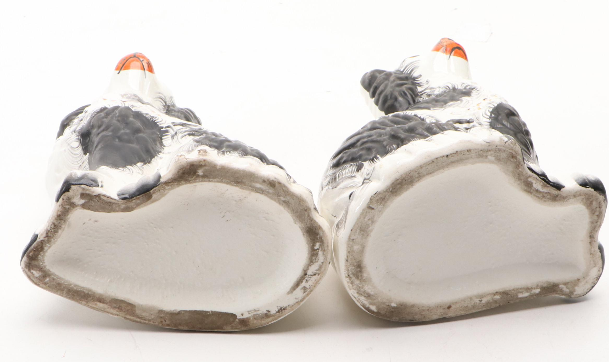 Pair of Staffordshire Black and White Spaniel Figurines, Late 19th Century