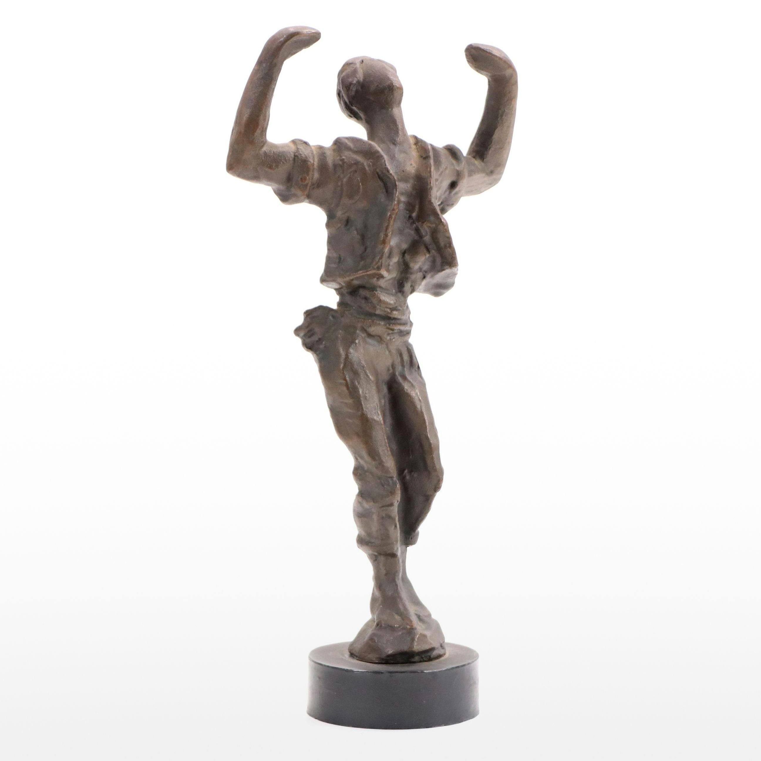 Stylized Bronze Figurine of Man in Triumphant Pose, Late 20th/21st Century