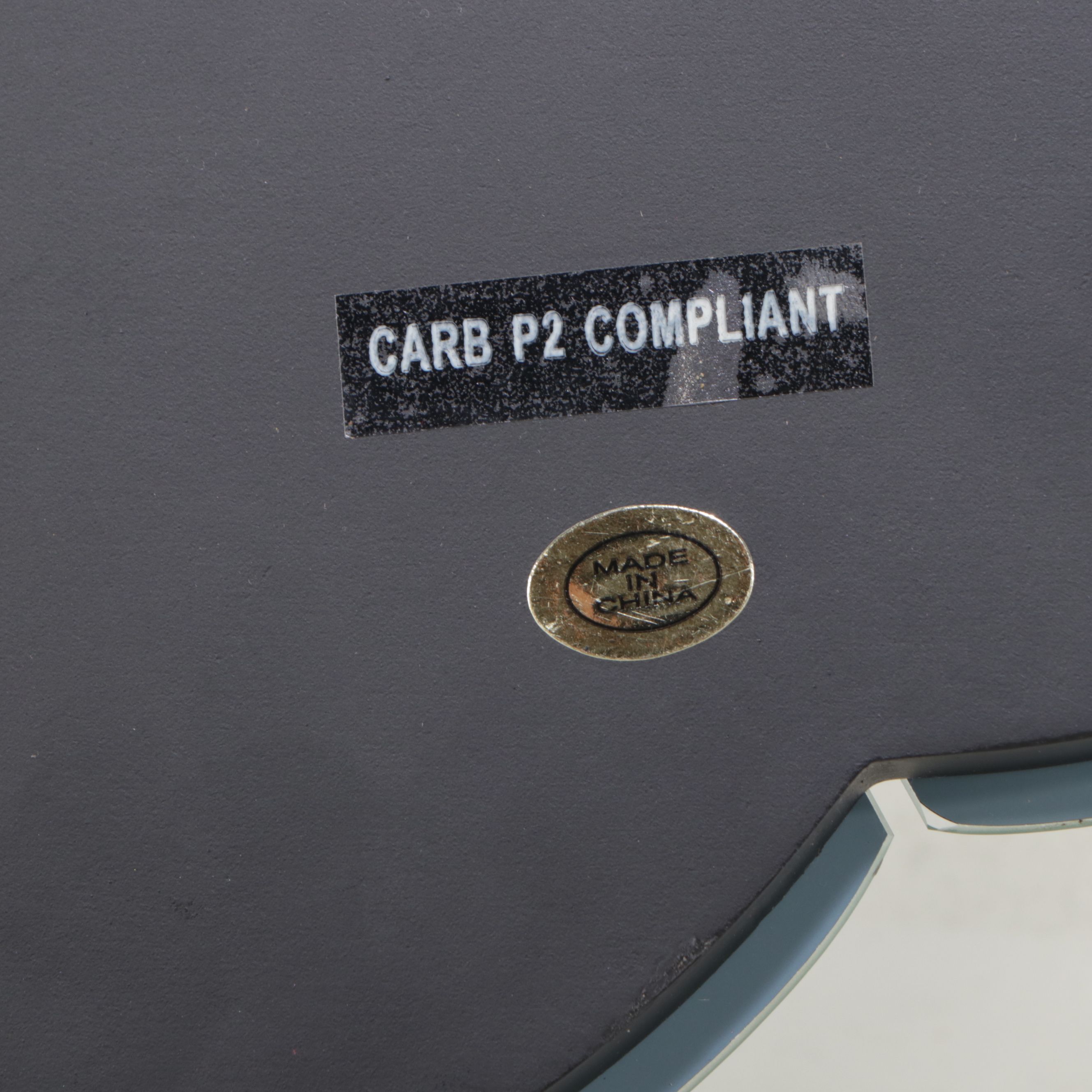 Modern Scalloped Wall Mirror with Floor Lamp and Mirrored Accent Table