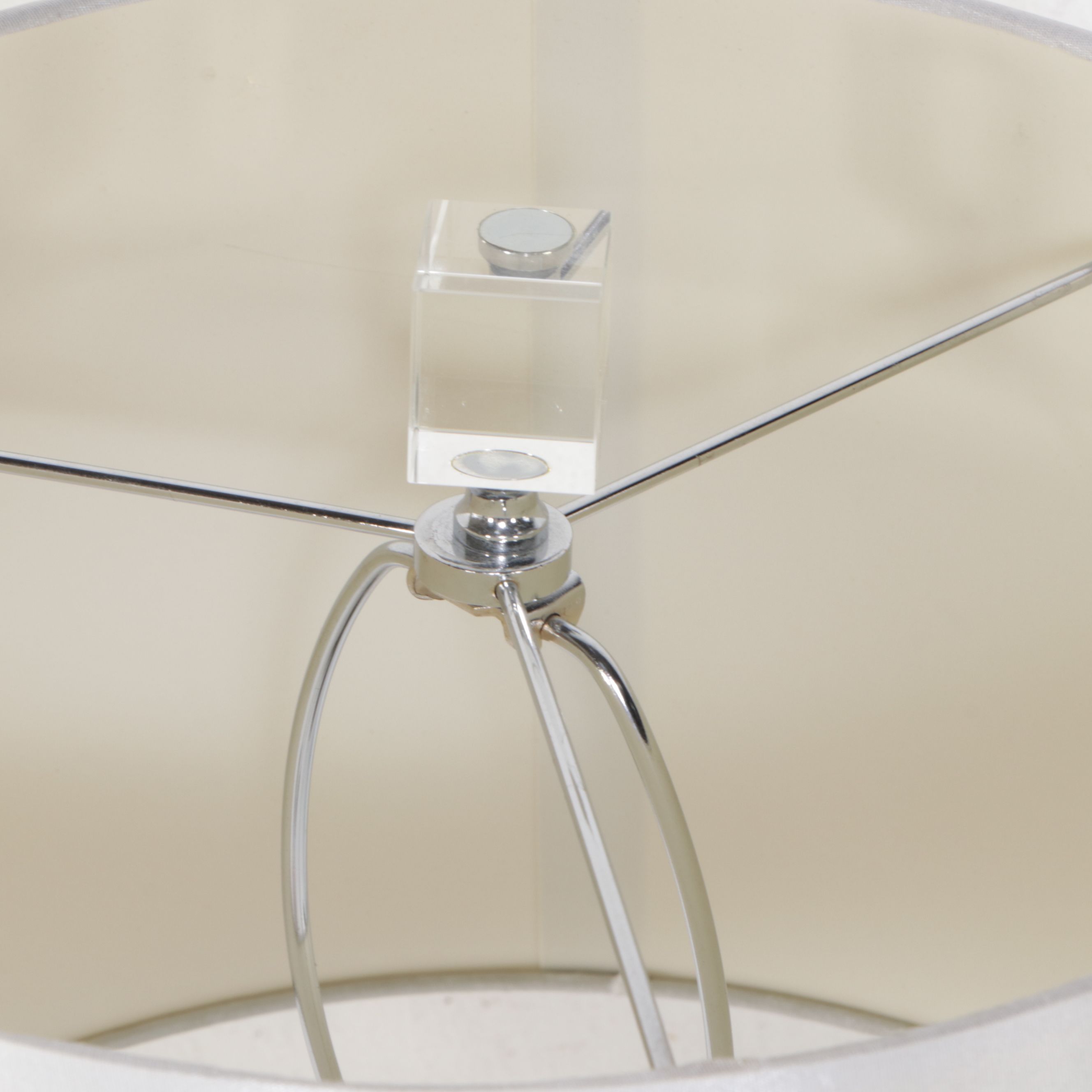 Modern Scalloped Wall Mirror with Floor Lamp and Mirrored Accent Table