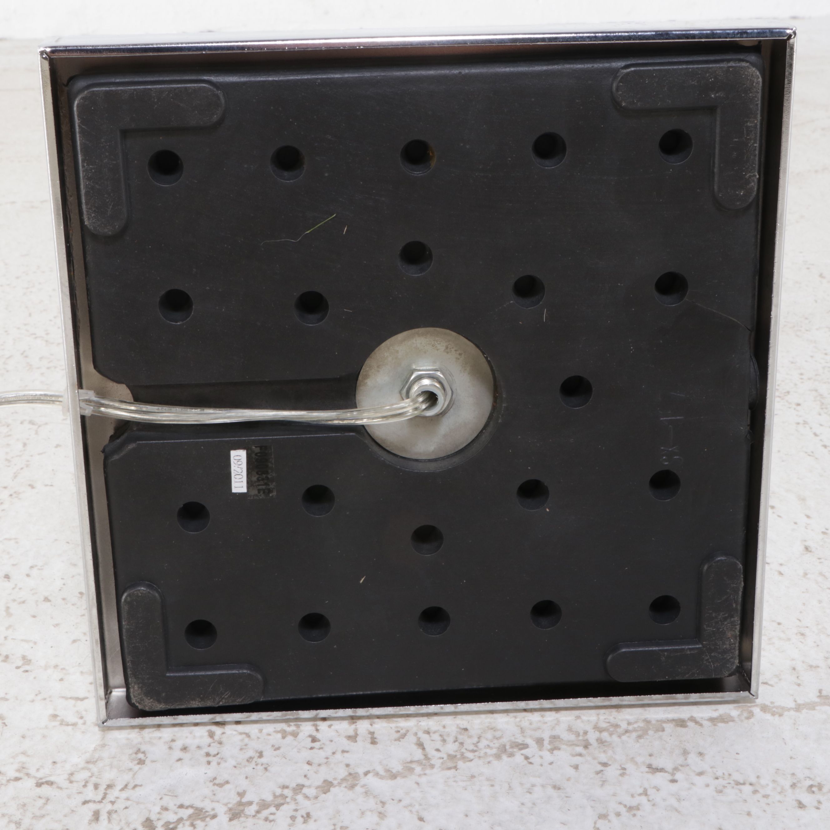 Modern Scalloped Wall Mirror with Floor Lamp and Mirrored Accent Table