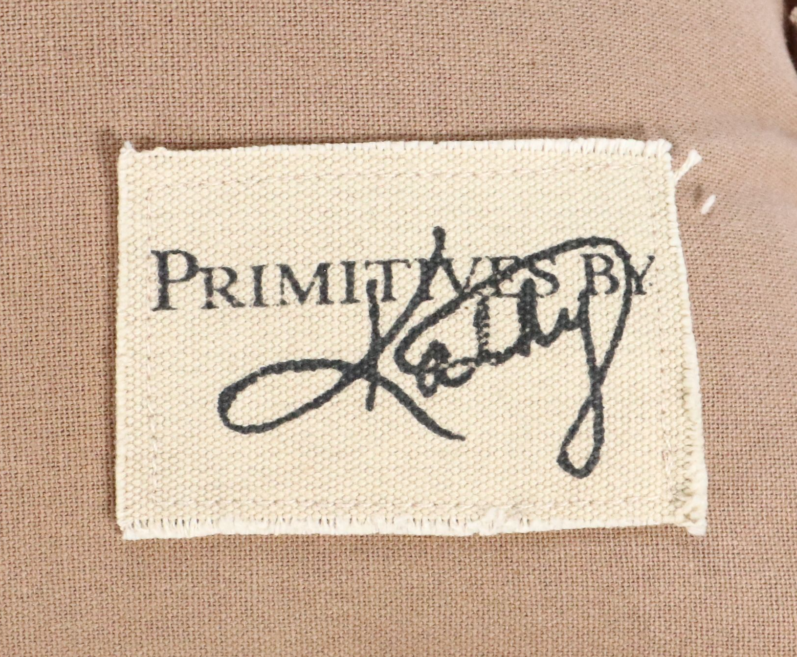 Wooden Cutout Ohio Wall Décor with Throw Pillows and Striped Hamper