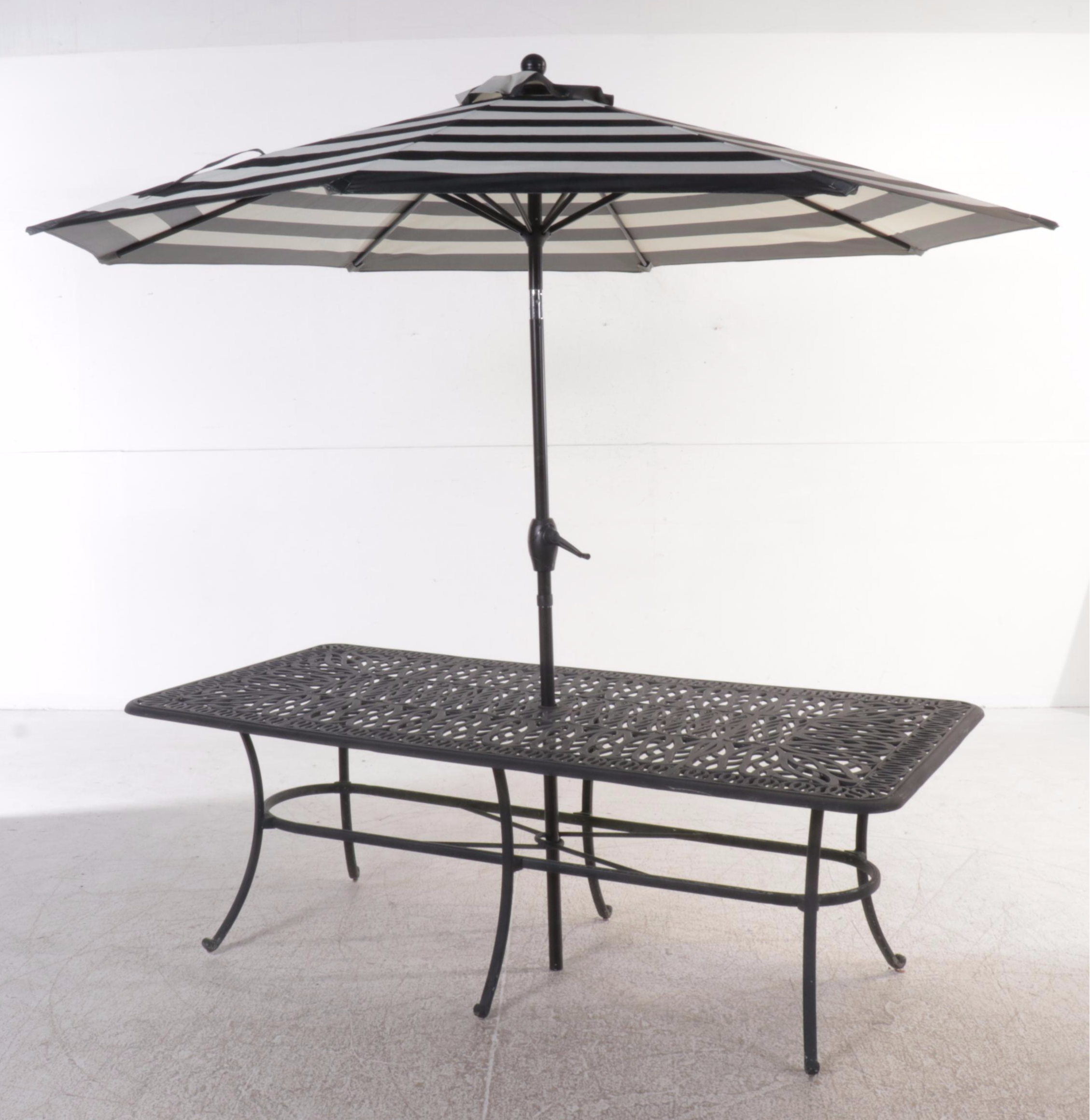 Cast Aluminum Seven-Piece Patio Dining Set with Umbrella