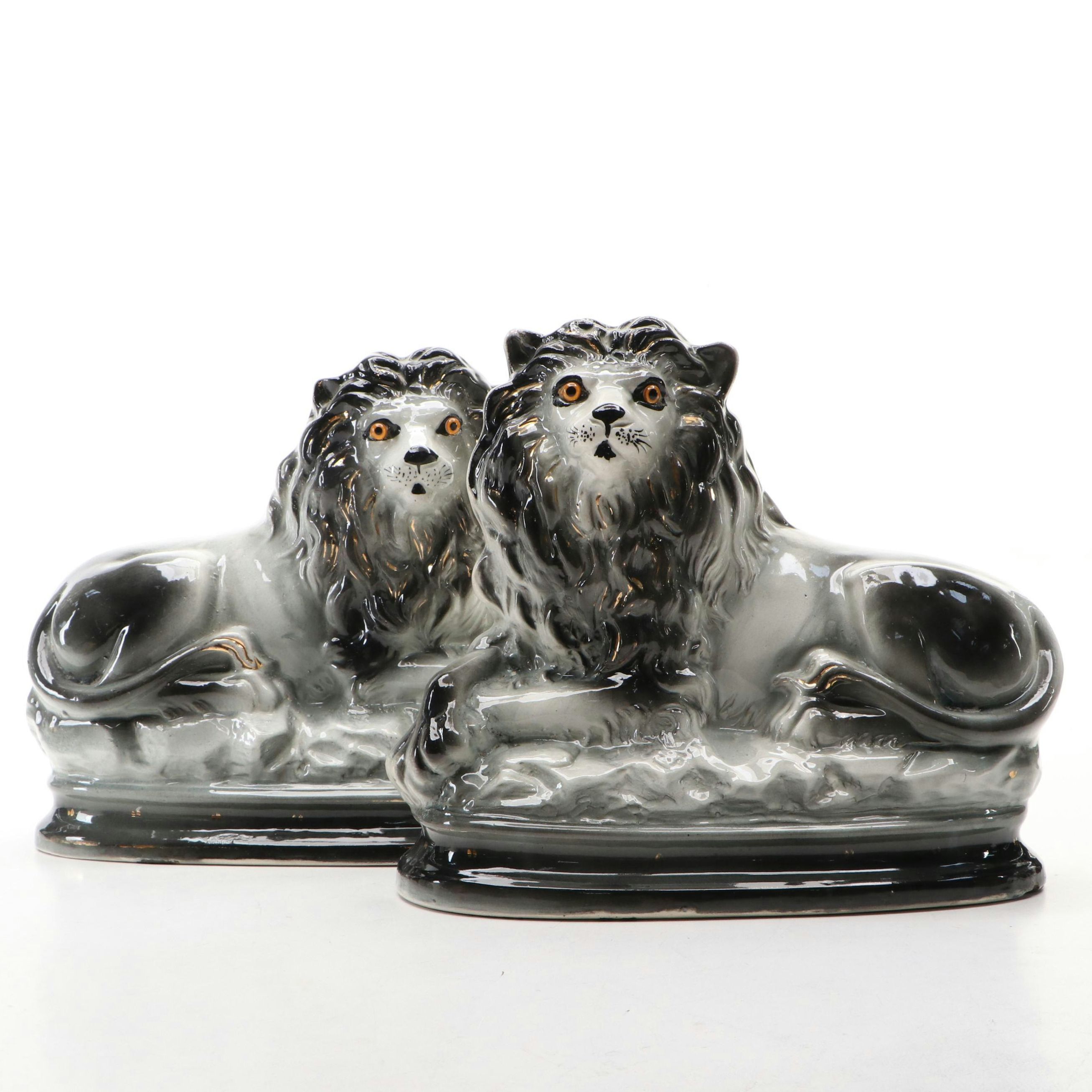 Pair of Bo'ness Staffordshire Glass Eyed Recumbent Lion Figurines