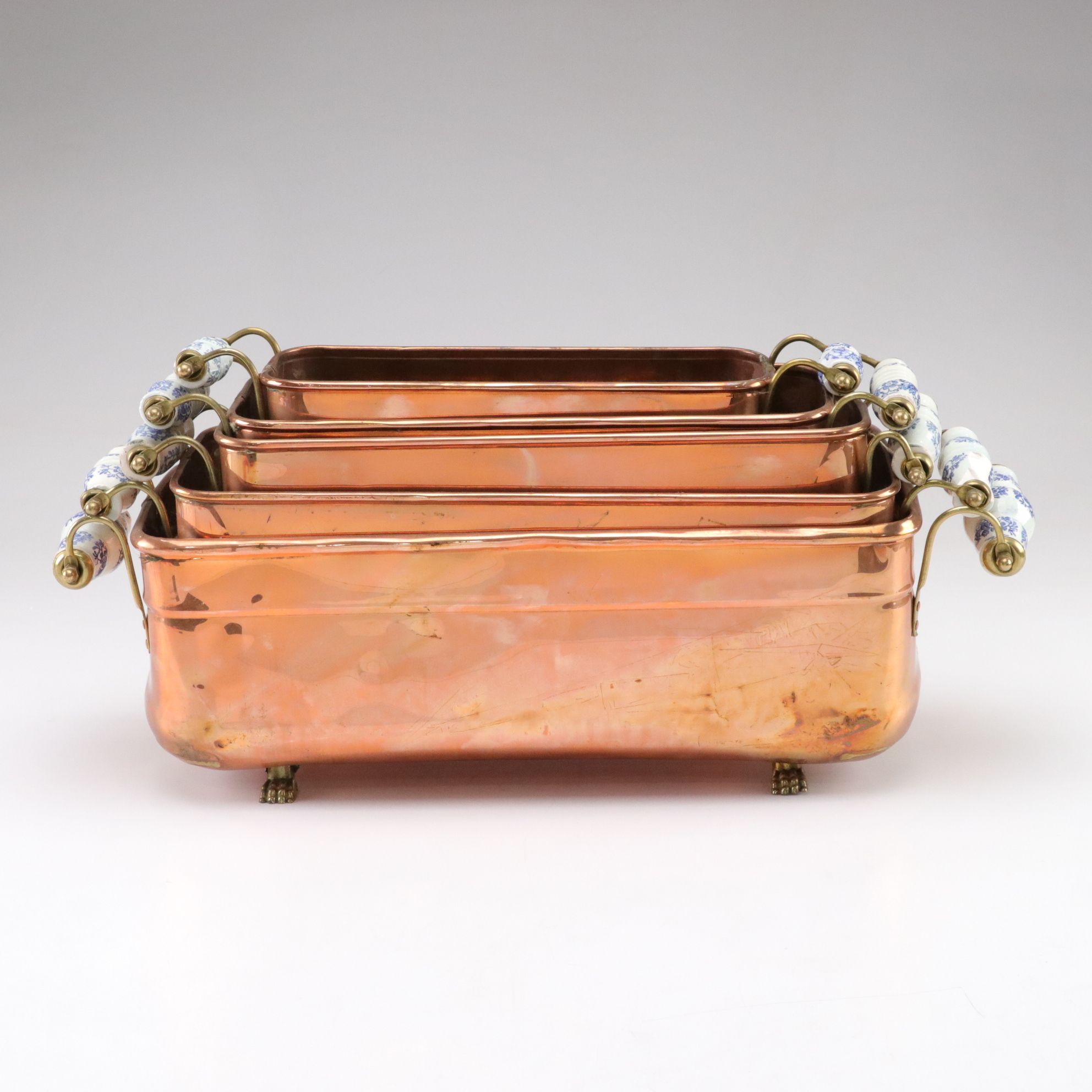Nesting Copper and Brass Footed Planters with Dutch Style Ceramic Handles