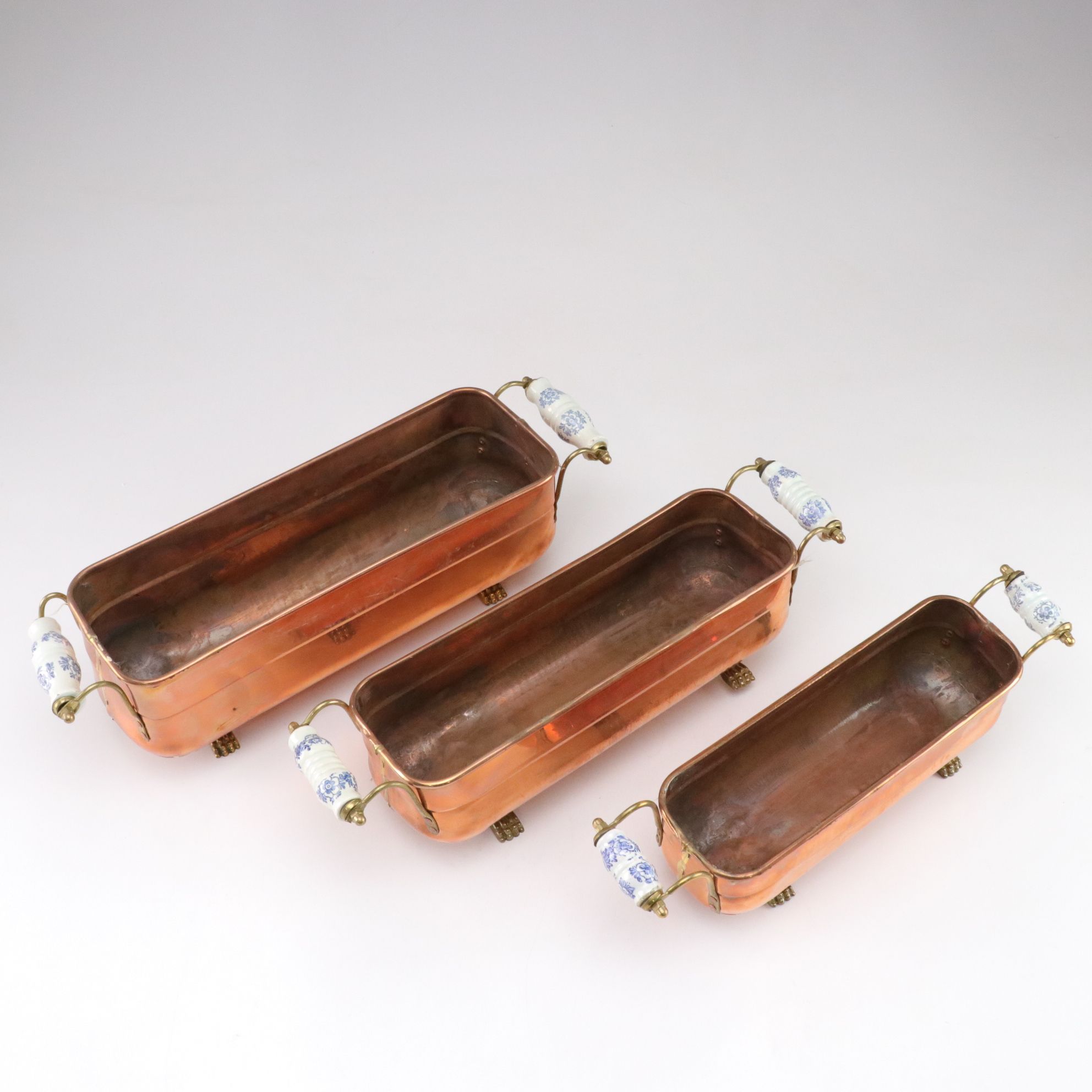 Nesting Copper and Brass Footed Planters with Dutch Style Ceramic Handles