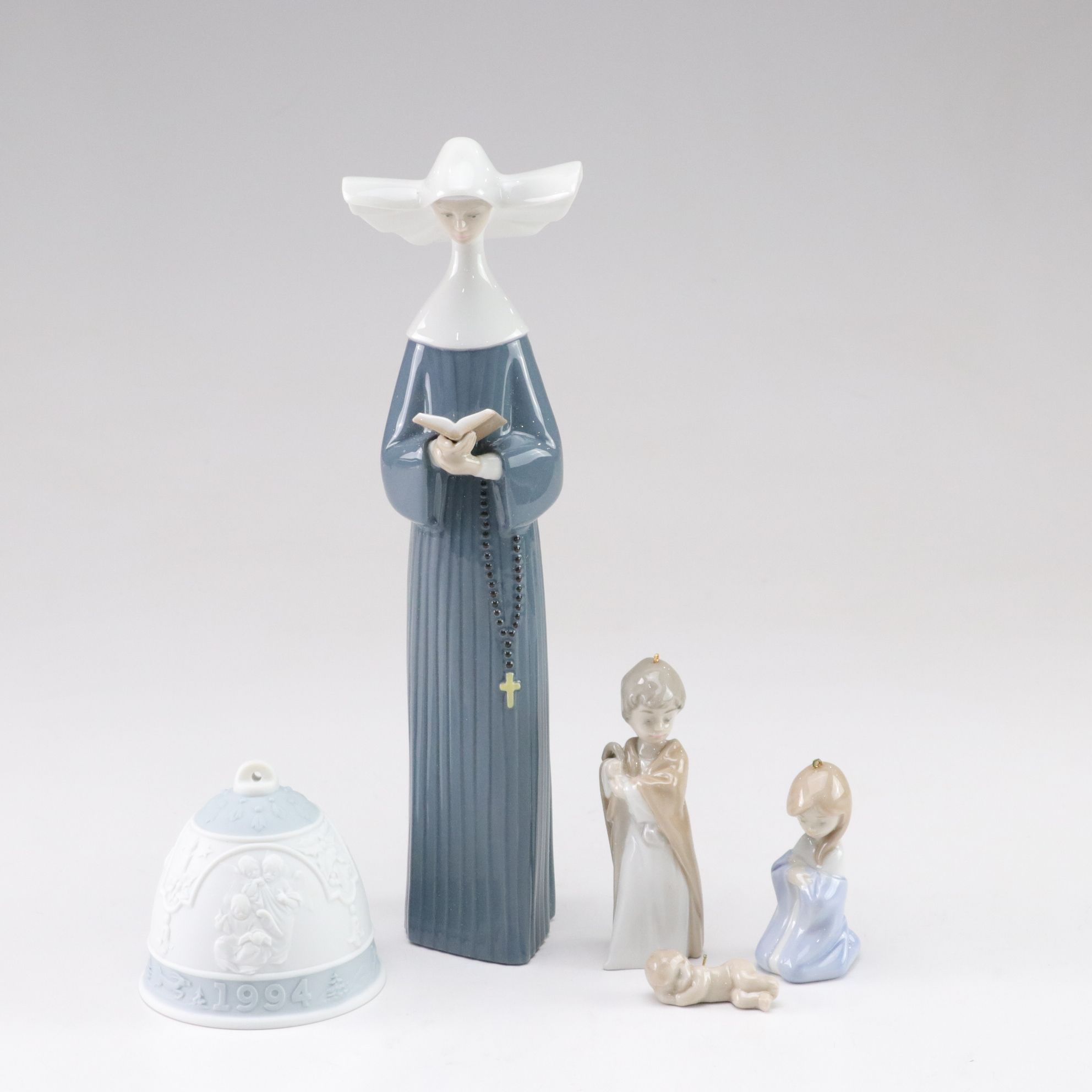 Lladró "Prayerful Moment" and "Mini Holy Family" with Christmas Bell, 1994