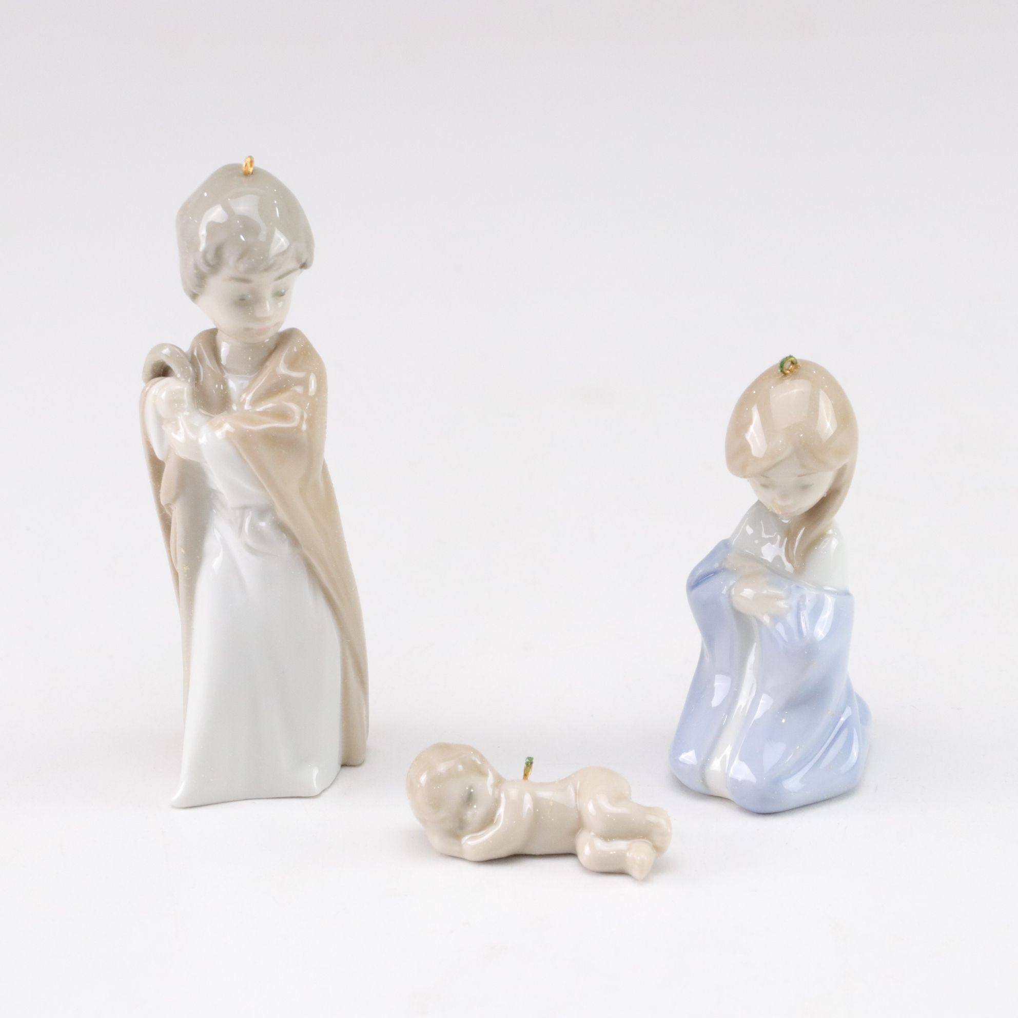 Lladró "Prayerful Moment" and "Mini Holy Family" with Christmas Bell, 1994
