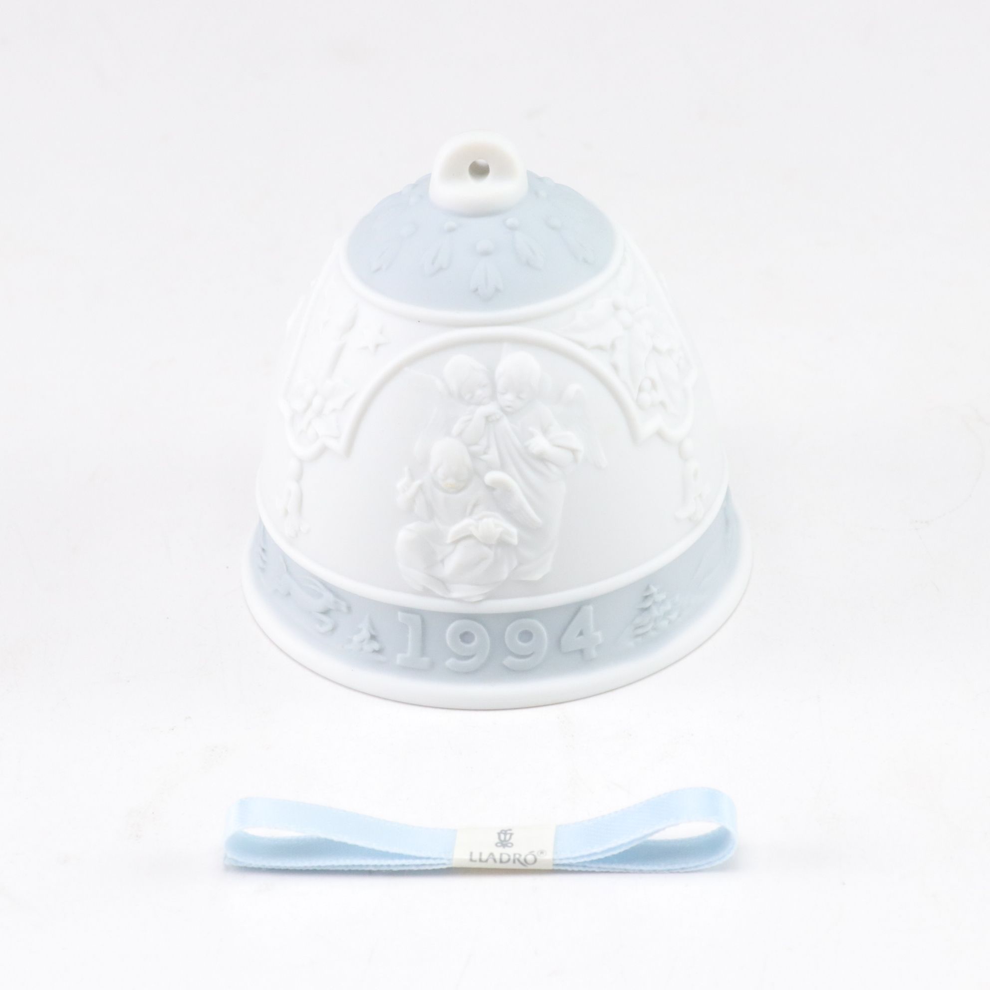 Lladró "Prayerful Moment" and "Mini Holy Family" with Christmas Bell, 1994