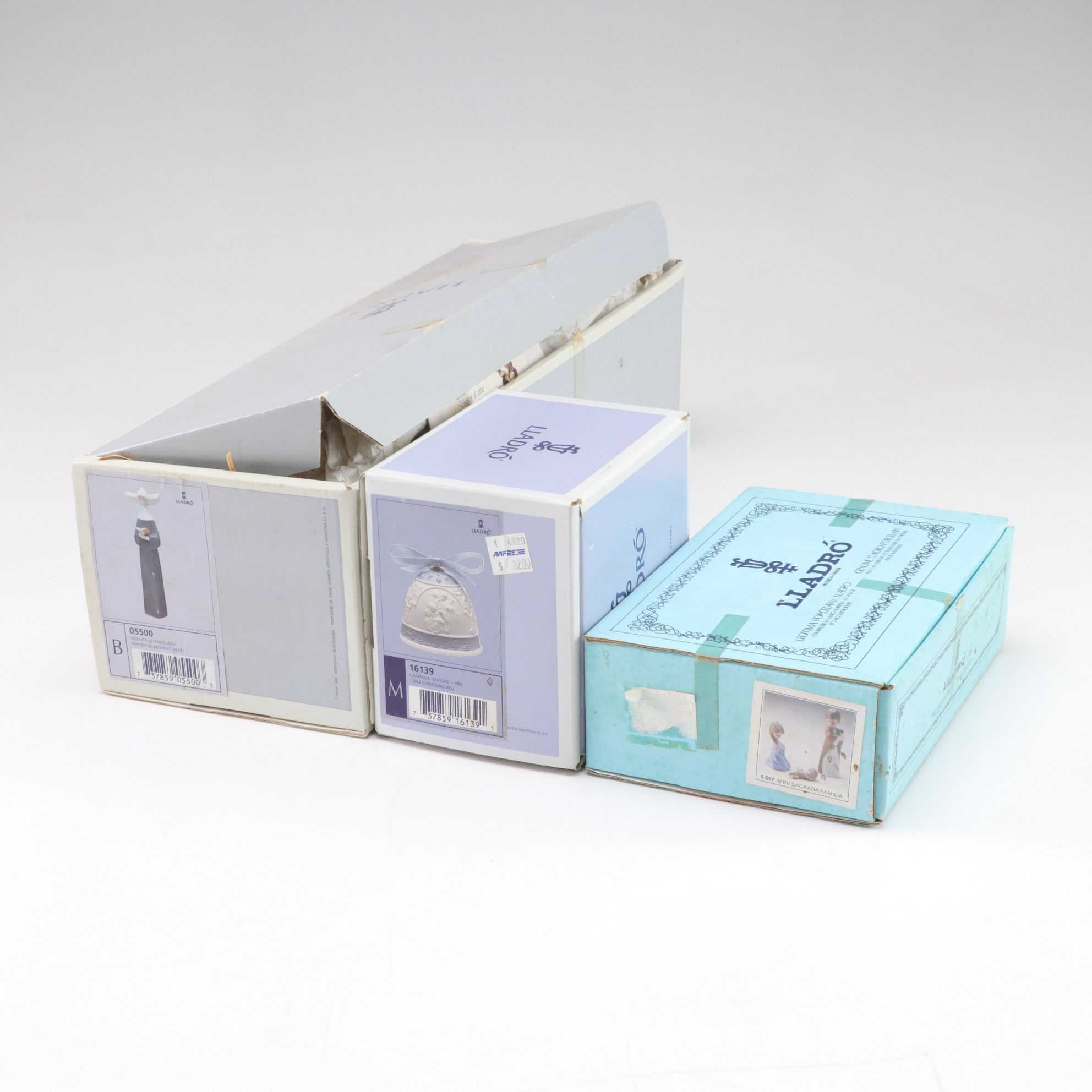 Lladró "Prayerful Moment" and "Mini Holy Family" with Christmas Bell, 1994