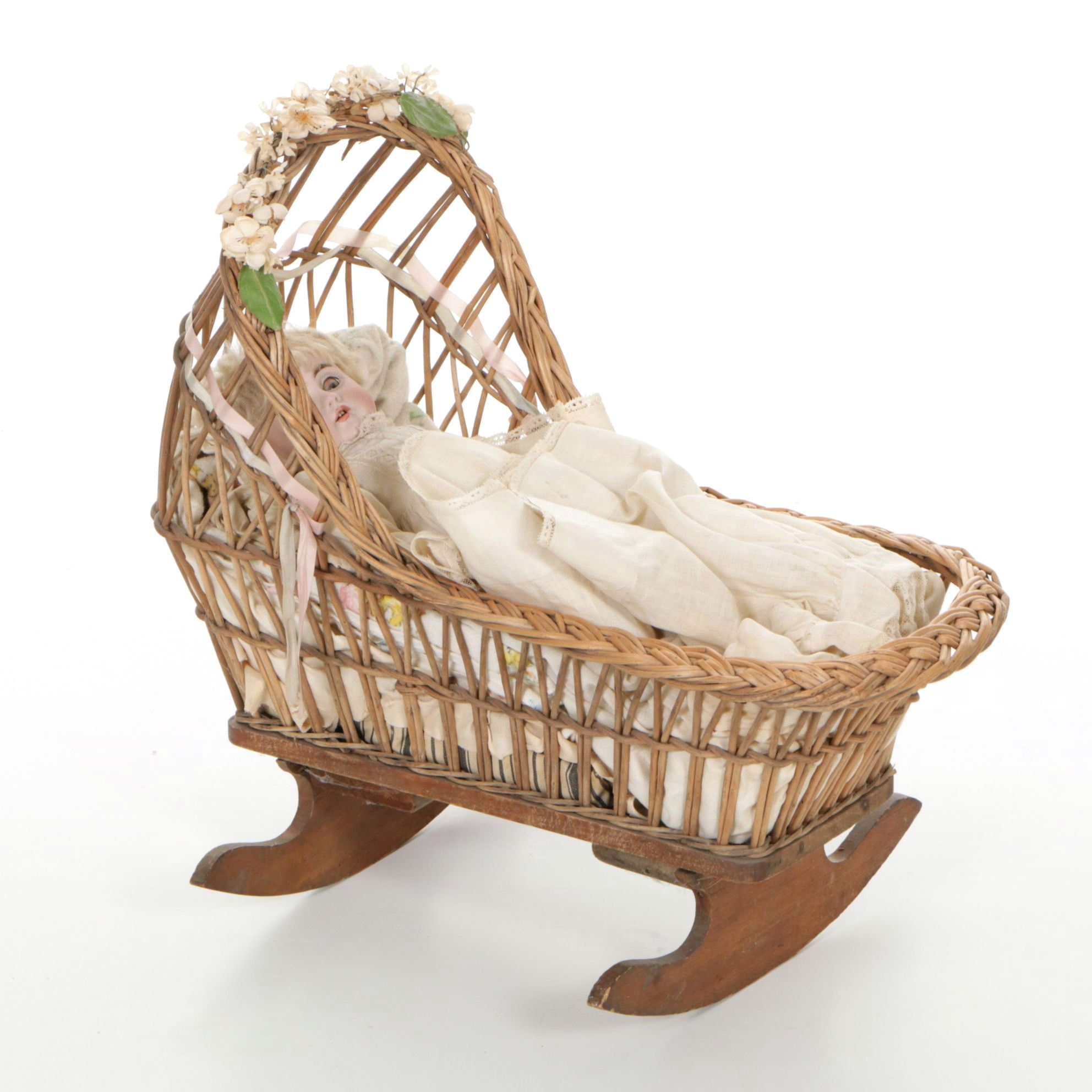 German Porcelain Open Mouth Doll with Composition Body and Wicker Cradle