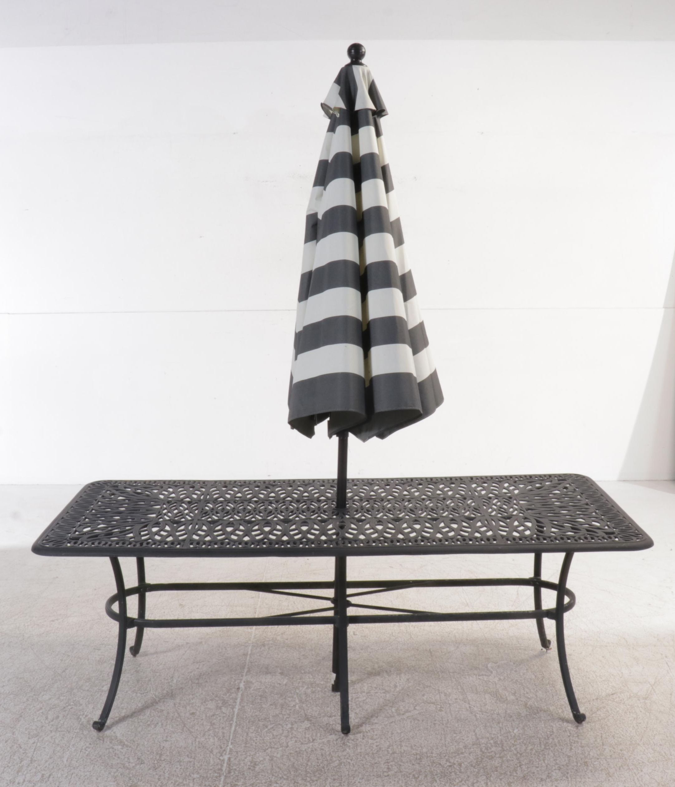 Cast Aluminum Seven-Piece Patio Dining Set with Umbrella