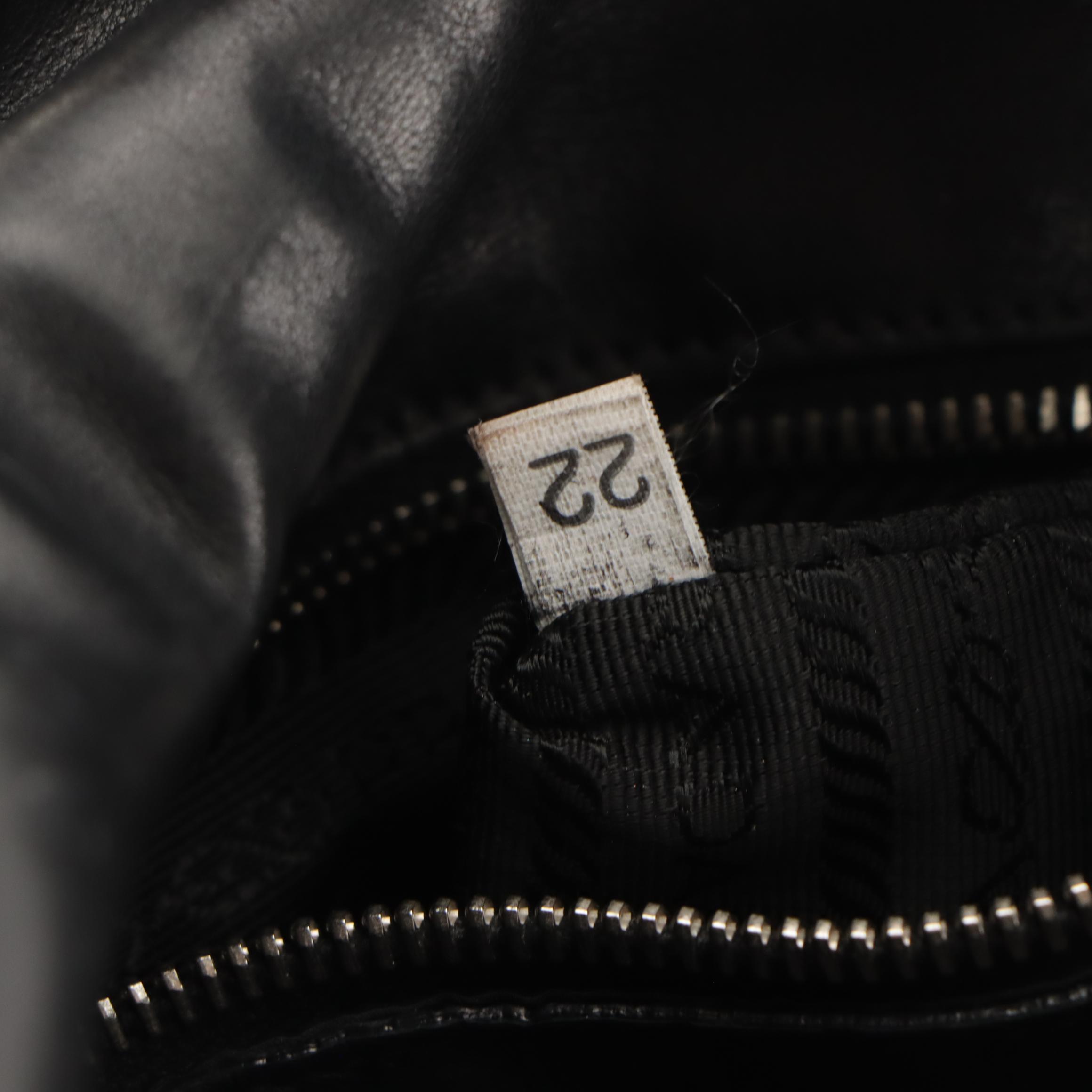 Prada Fold Over Tuck Lock Shoulder Bag in Black Leather