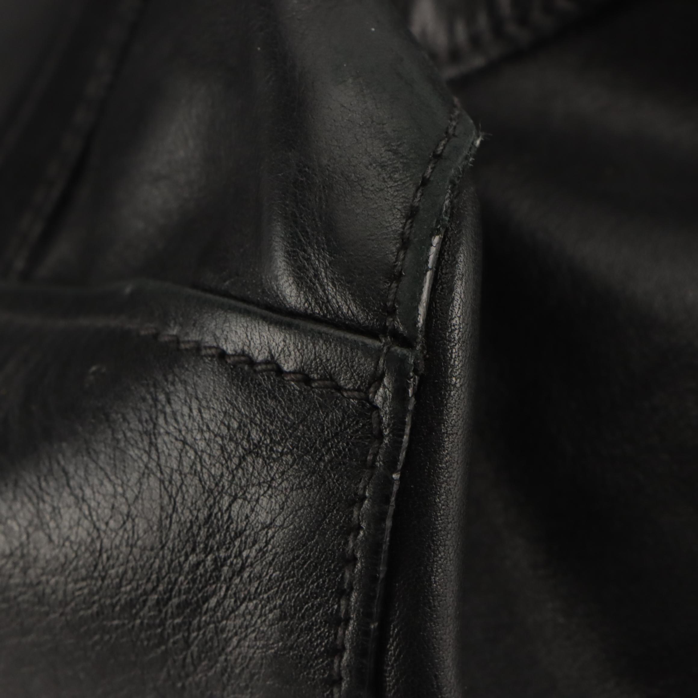 Prada Fold Over Tuck Lock Shoulder Bag in Black Leather